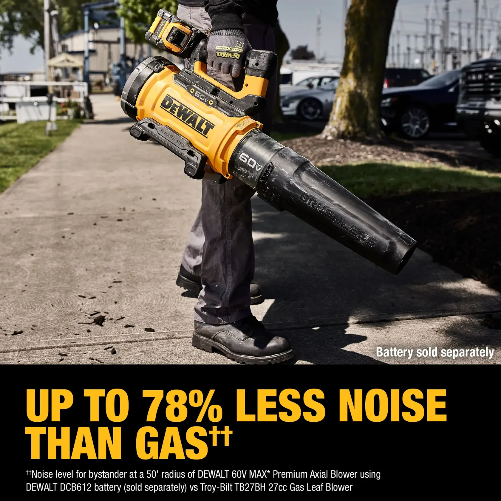 A person holding a DEWALT 60V MAX Premium Axial Blower on a sidewalk, with text indicating the blower produces up to 78% less noise than gas-powered models. The blower is yellow and black, and the battery is sold separately.