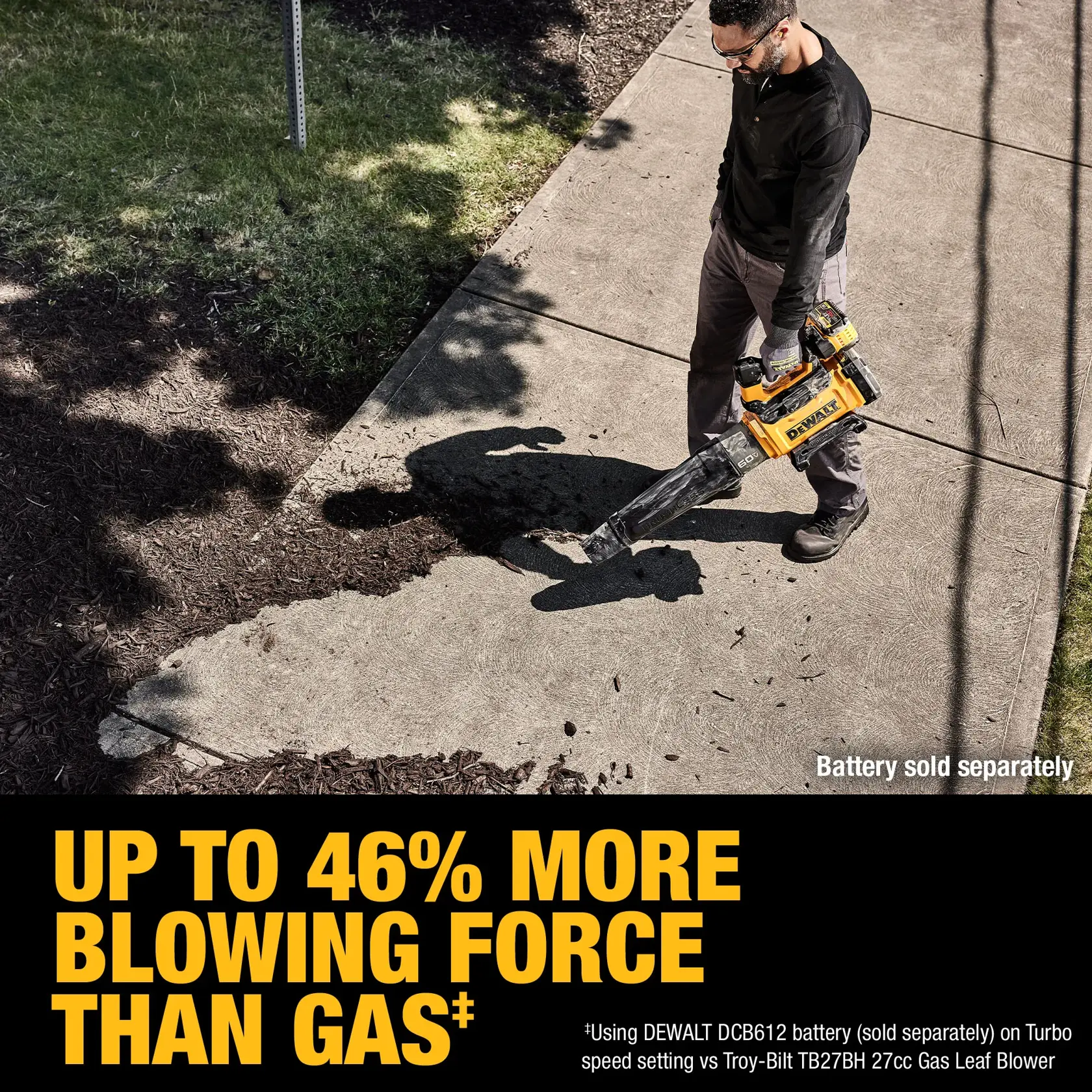 A person is using a DEWALT DCBL777B cordless leaf blower to clear debris from a sidewalk near grass and mulch, with a note indicating that the battery is sold separately. Bold yellow text reads 'UP TO 46% MORE BLOWING FORCE THAN GAS,' and smaller text explains this is using a specific DEWALT battery on turbo speed compared to a gas leaf blower.