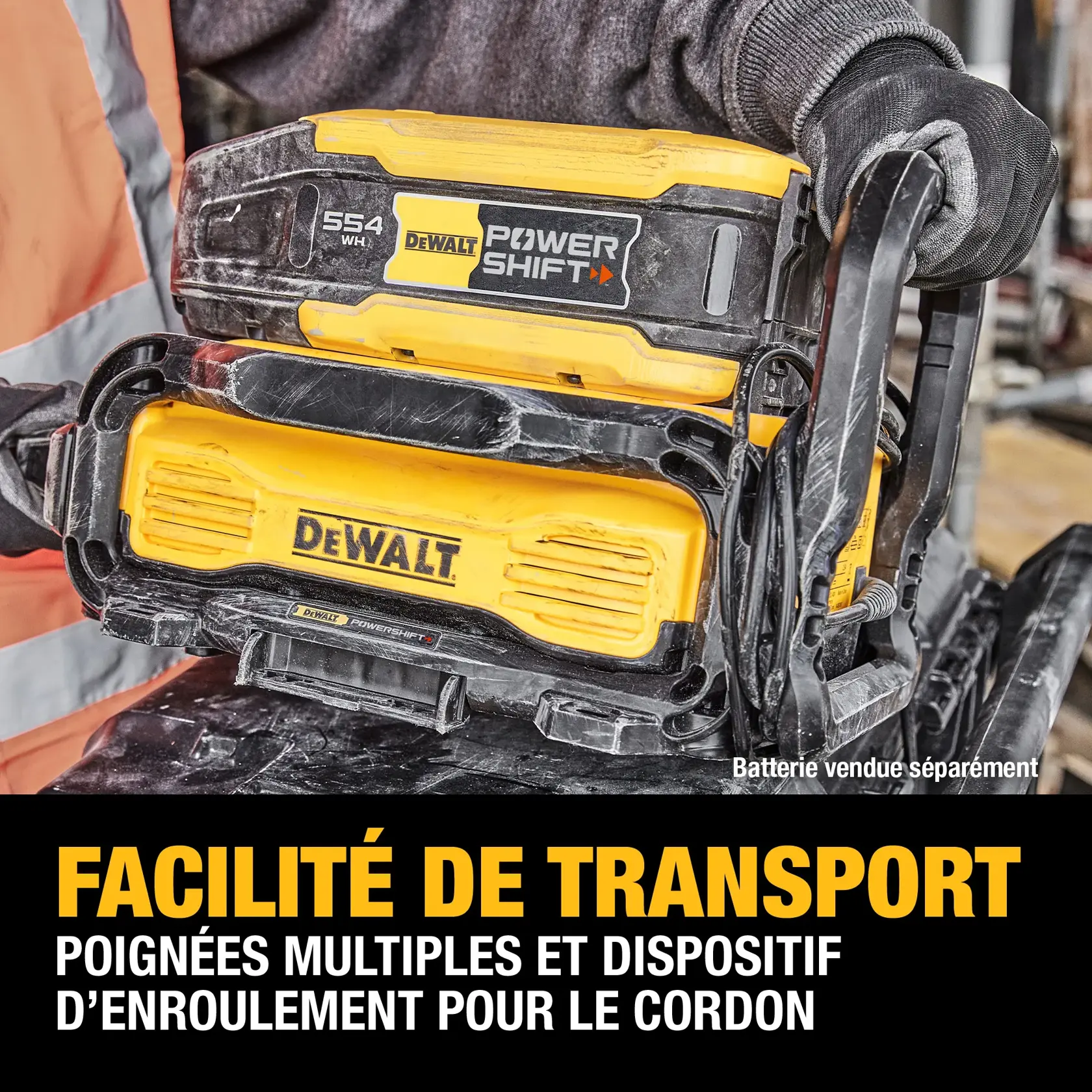 Close-up of a DEWALT PowerShift portable power unit being carried by a person wearing gloves. The image highlights the multiple grip positions and convenient cord wrap for easy transport. Text overlay reads: 'ENHANCED PORTABILITY. MULTIPLE GRIP POSITIONS AND CONVENIENT CORD WRAP FOR EASY TRANSPORT.' Battery sold separately.