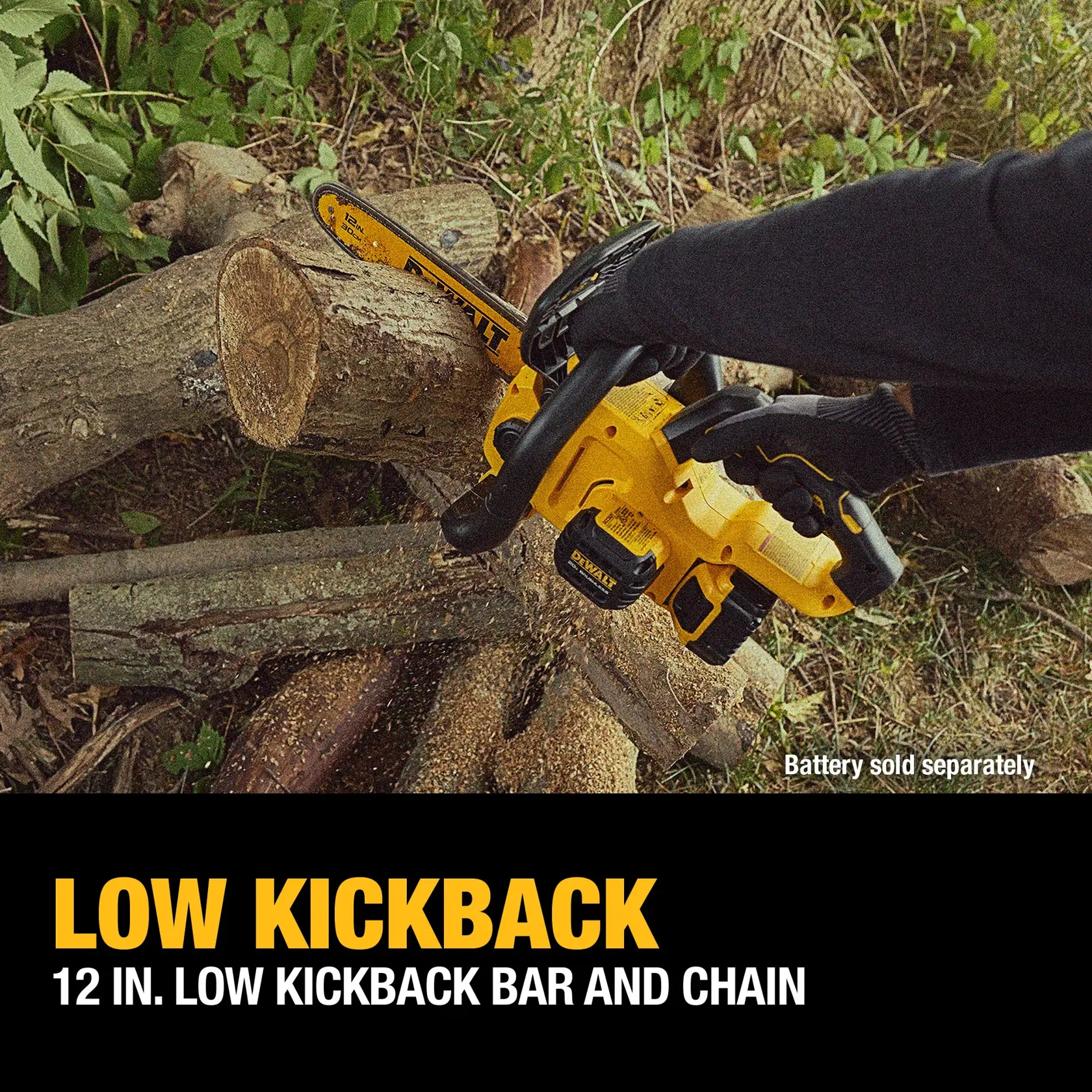 A person using a yellow DEWALT cordless chainsaw with a 12-inch low kickback bar and chain to cut a log outdoors. The chainsaw is battery-powered and the battery is sold separately. Text at the bottom highlights the low kickback feature.