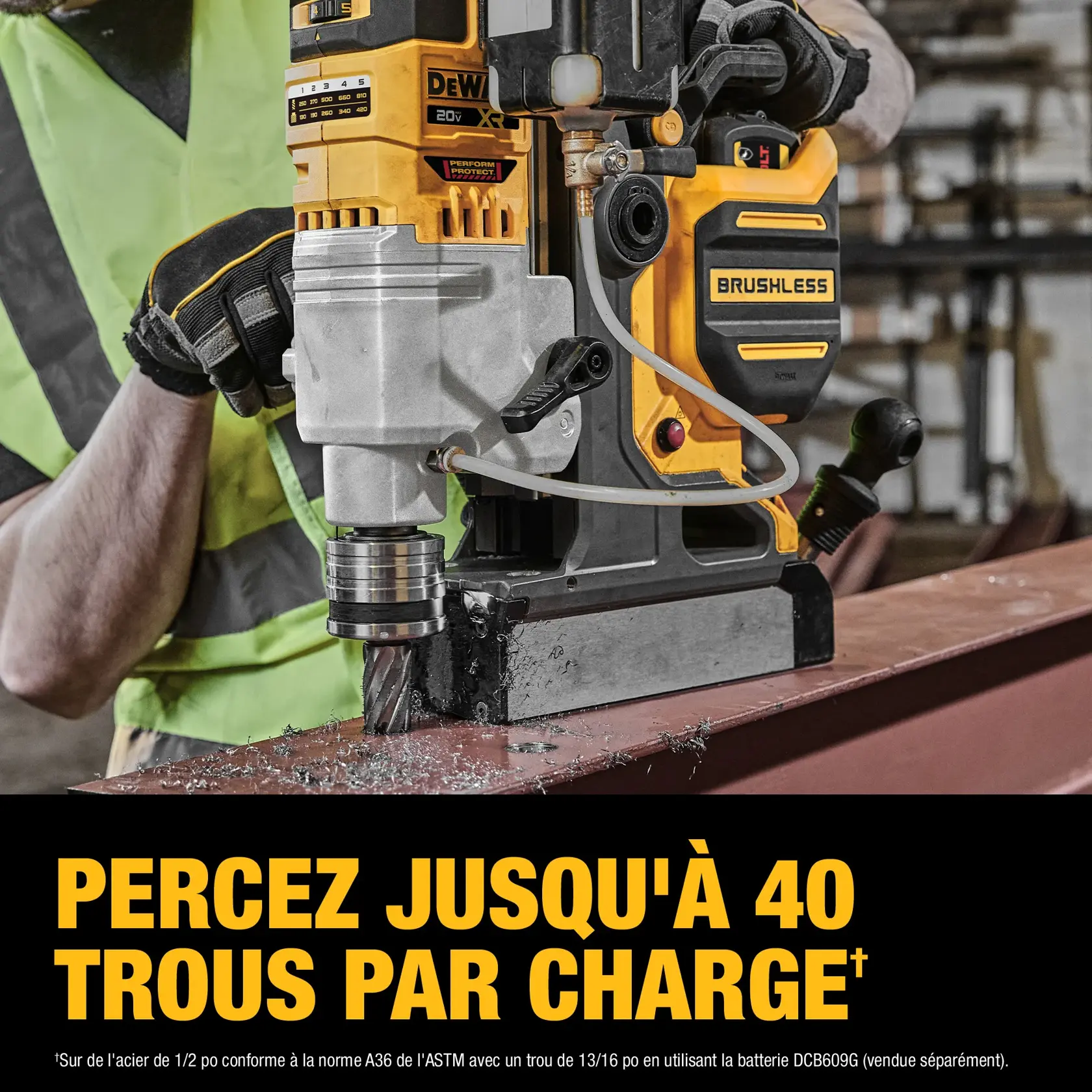 A worker uses a DEWALT brushless magnetic drill on a steel beam in an industrial setting. Text on the image reads: 'DRILL UP TO 40 HOLES PER CHARGE.'