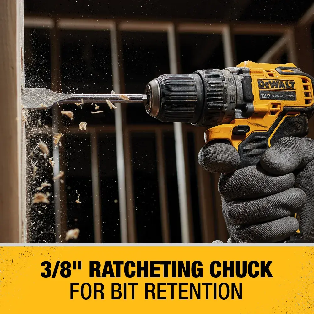 A gloved hand holds a yellow and black DEWALT cordless drill with a 3/8-inch ratcheting chuck, shown drilling into wood with wood shavings flying. Text below reads: '3/8" ratcheting chuck for bit retention.'