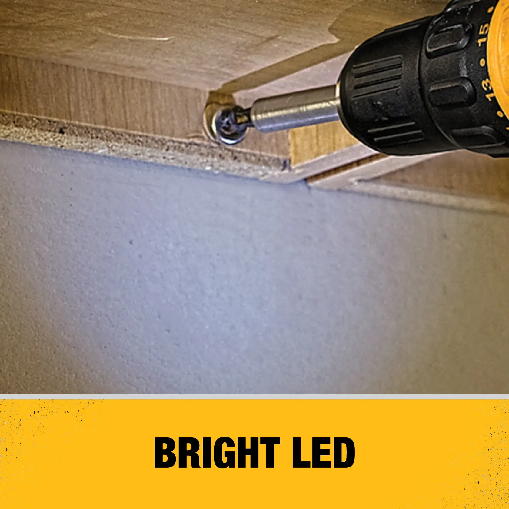 A close-up view of a DEWALT cordless drill driving a screw into a piece of wood, illuminated by a bright LED light. The bottom of the image features a yellow banner with the text 'BRIGHT LED'.