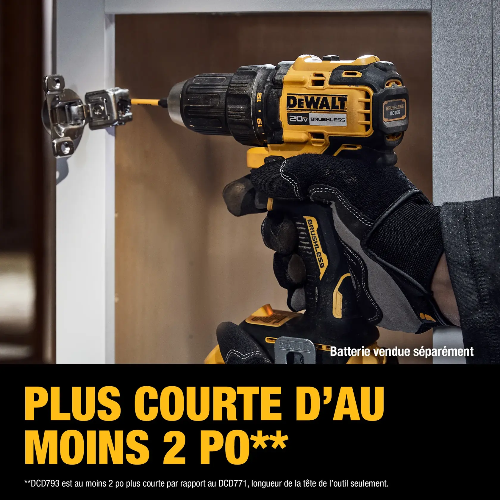 A gloved hand using a DEWALT 20V brushless cordless drill to install a hinge on a cabinet. The text at the bottom highlights that the drill is over 2 inches shorter in length compared to a previous model. Battery sold separately.