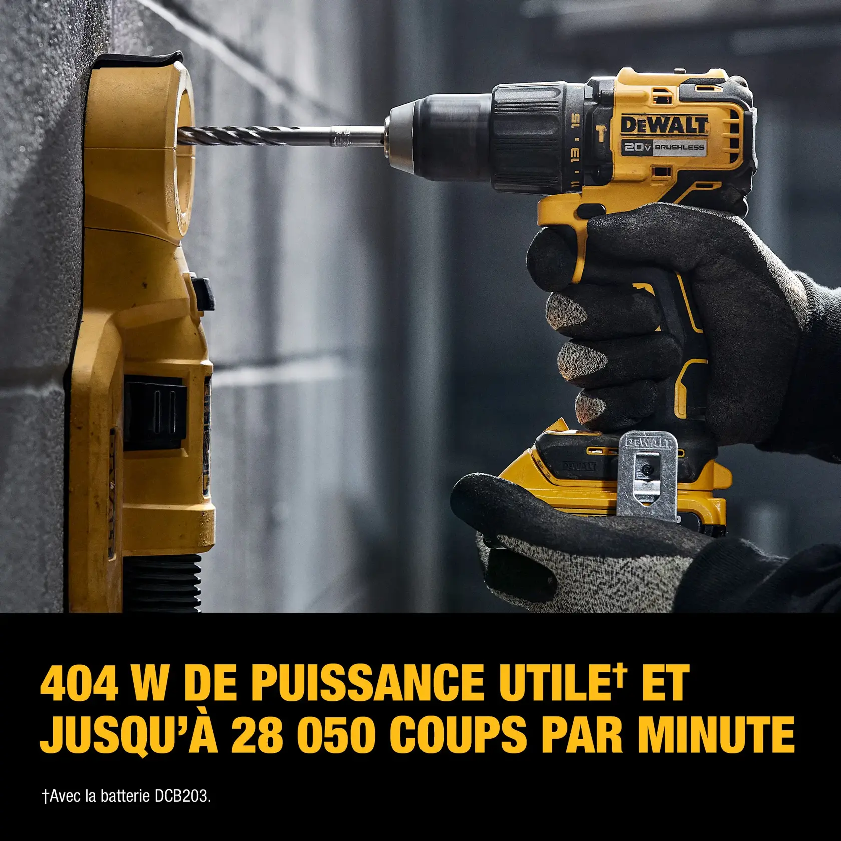A person wearing gloves operates a DEWALT 20V brushless cordless drill, drilling into a concrete wall. Text highlights its power: 404 UWO and up to 28,050 BPMs, based on using a DCB203 battery.