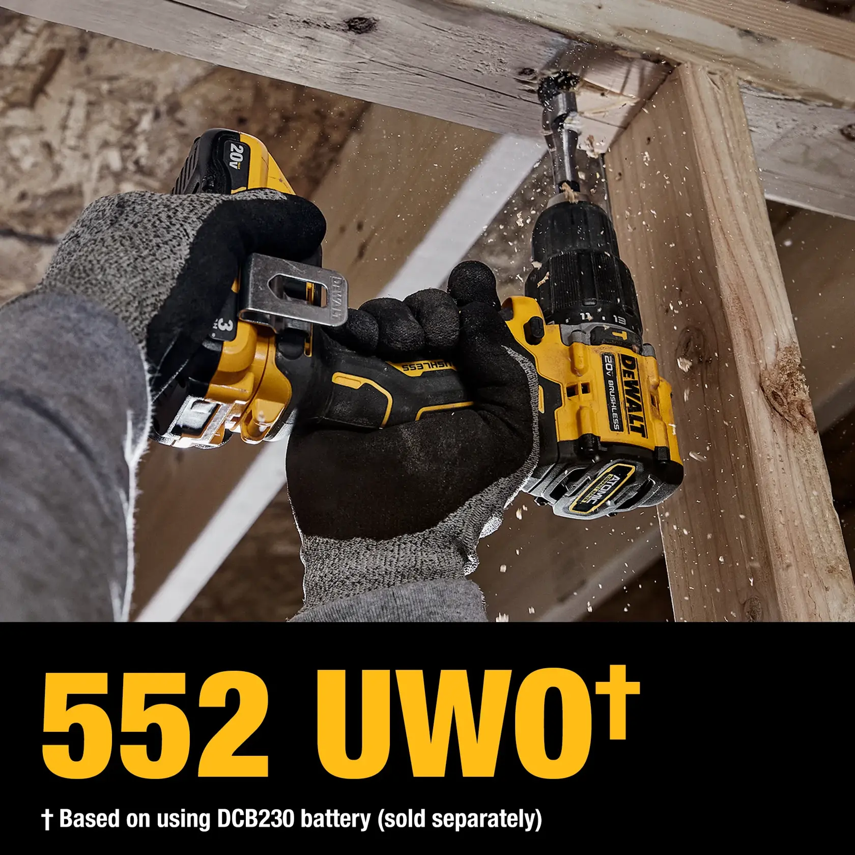 Gloved hands use a DEWALT DCD799B drill on wood. Drill power is highlighted as 552 UWO. Battery sold separately.