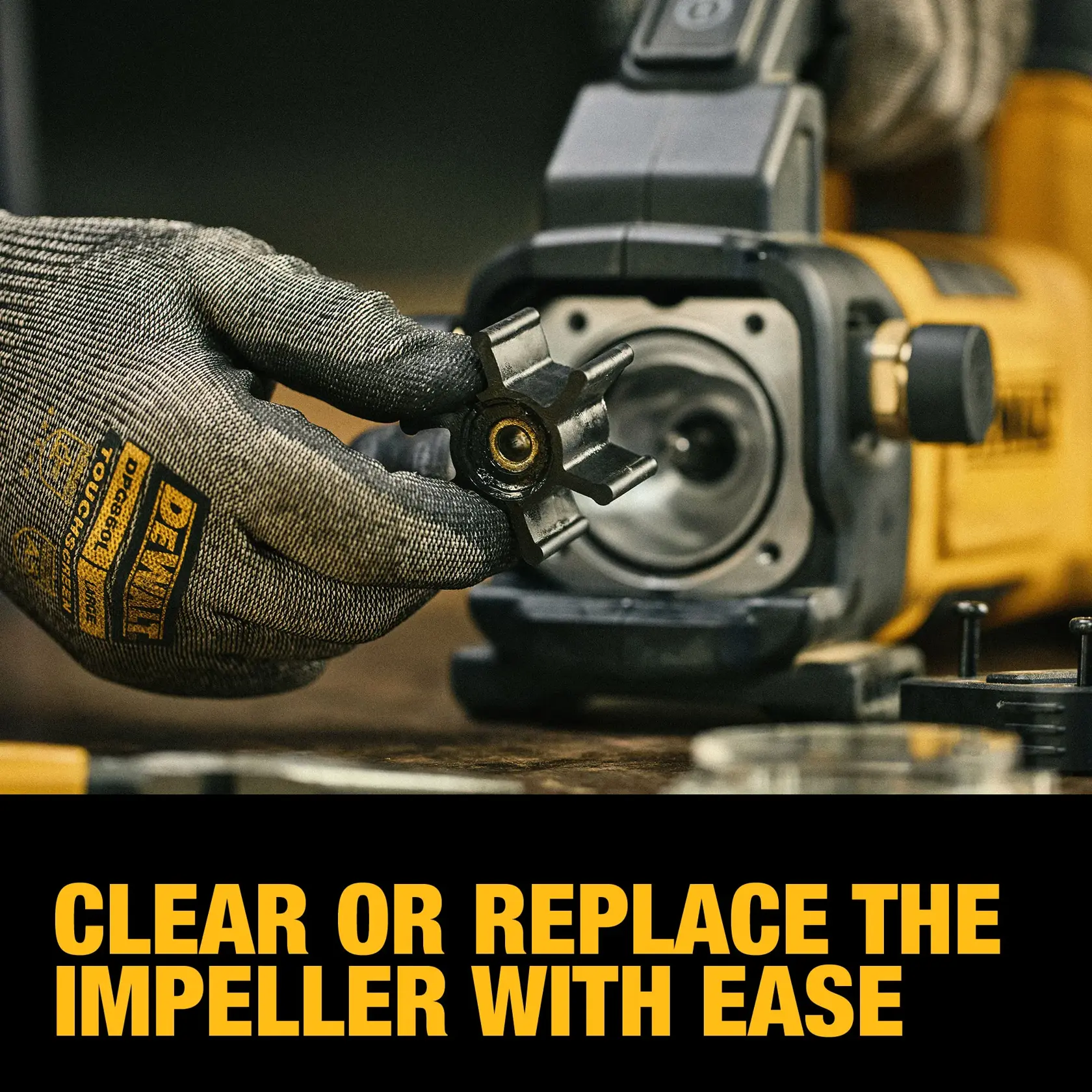 A gloved hand holding an impeller in front of a DEWALT tool, demonstrating easy removal or replacement. The text below reads: 'Clear or replace the impeller with ease.'
