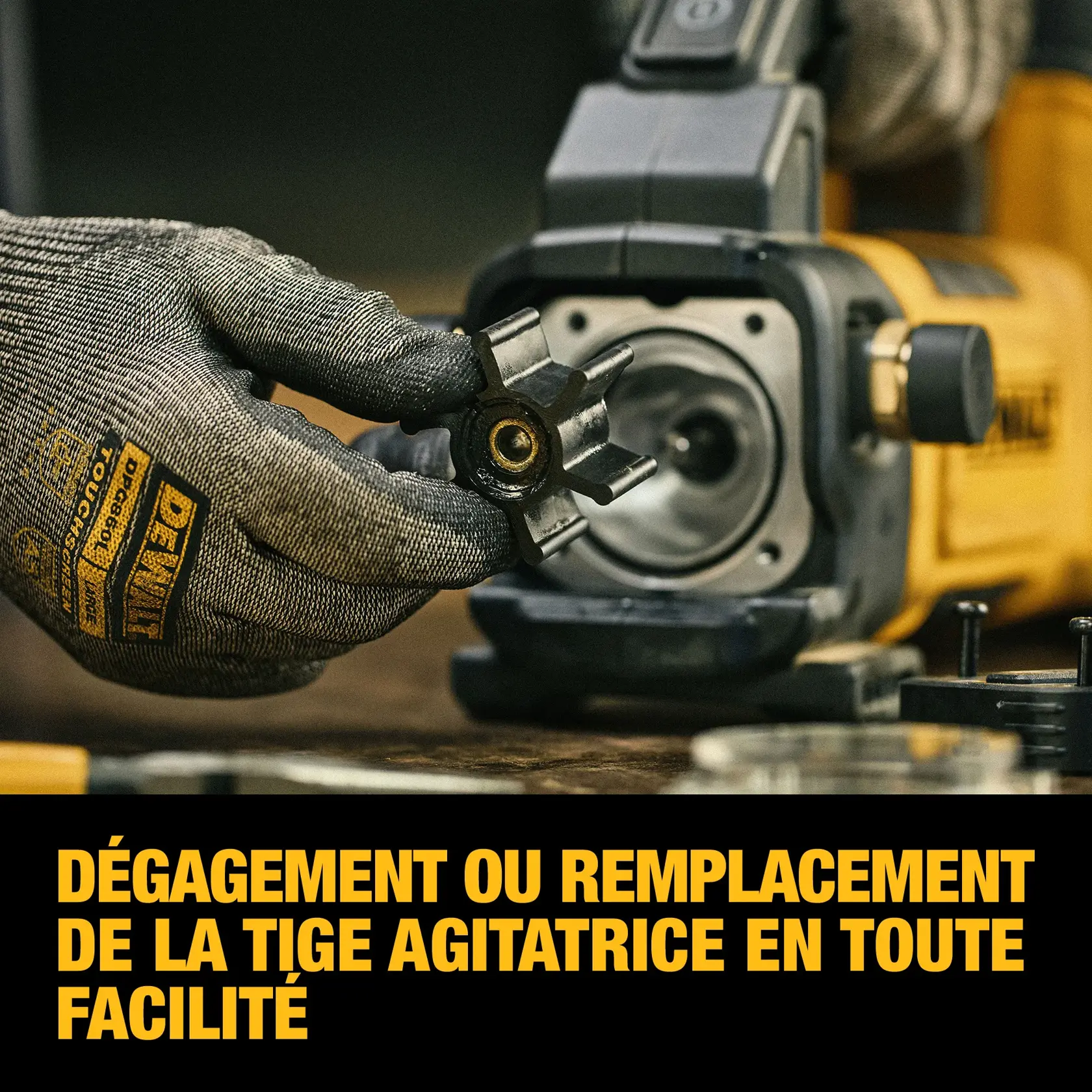 A gloved hand holding an impeller in front of a DEWALT tool, demonstrating easy removal or replacement. The text below reads: 'Clear or replace the impeller with ease.'
