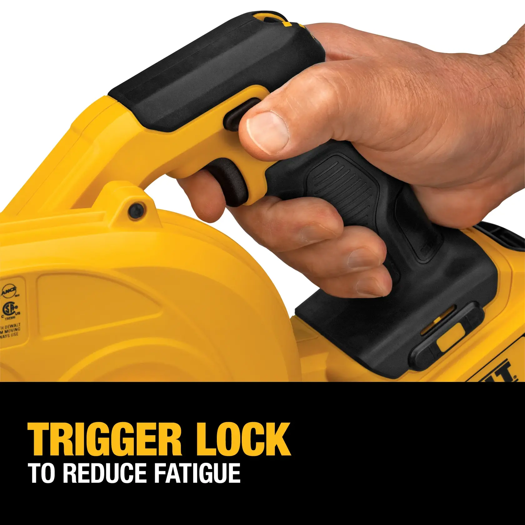 Close-up of a hand gripping the handle of a yellow and black DEWALT power tool, with a trigger lock feature highlighted to reduce fatigue.
