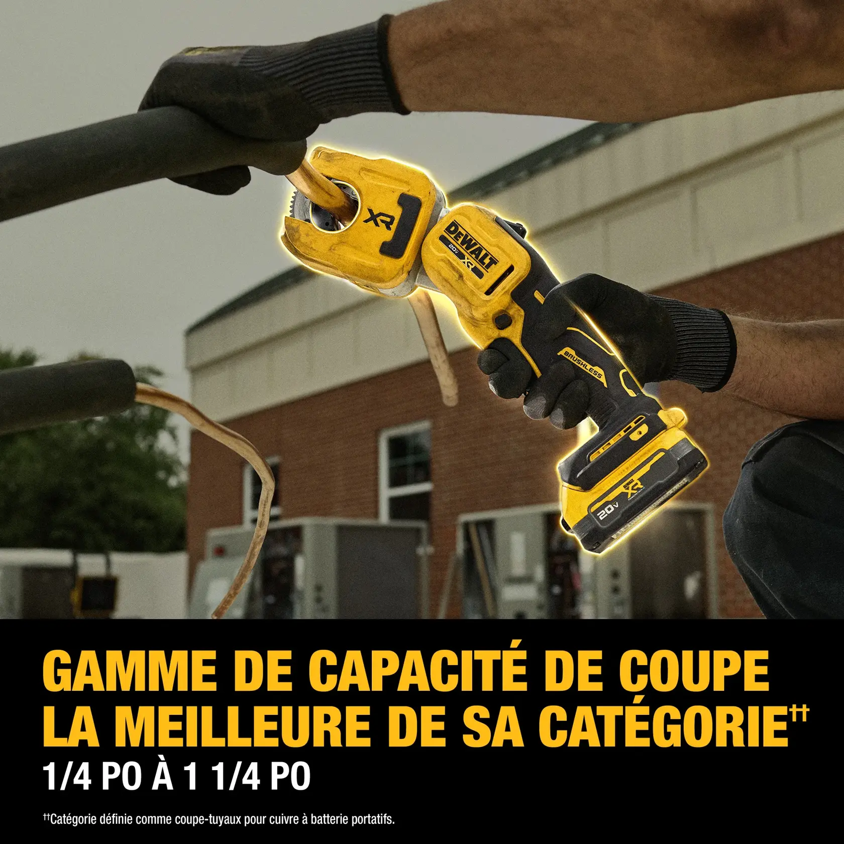 DEWALT cordless copper tubing cutter in use outdoors, cutting a pipe. Best-in-class cut capacity noted.