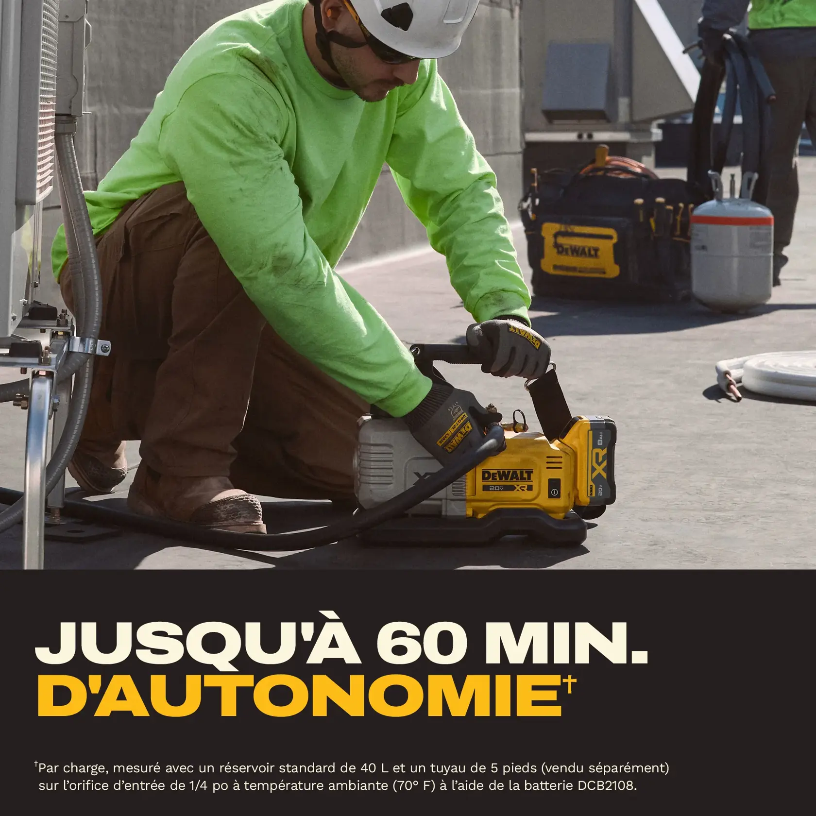 A person wearing a neon green shirt, brown pants, gloves, and a helmet operates a DEWALT cordless tool outdoors, with DEWALT-branded bags and equipment visible in the background. Bold text at the bottom states 'Up to 60 Minutes of Runtime.'
