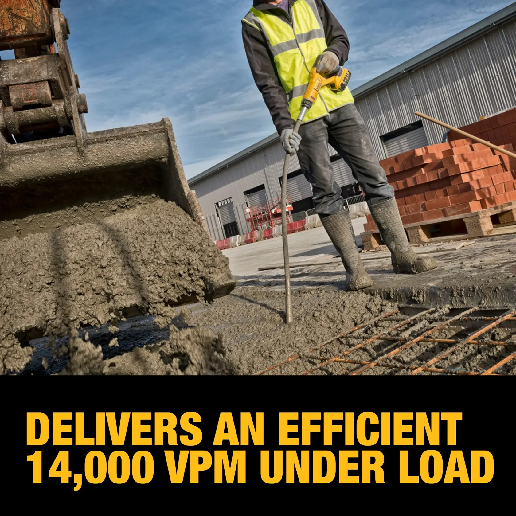 A construction worker in a yellow safety vest uses a DEWALT handheld concrete vibrator tool on a fresh concrete pour at a construction site, with a large excavator bucket pouring concrete nearby. Text reads: 'Delivers an efficient 14,000 VPM under load.'