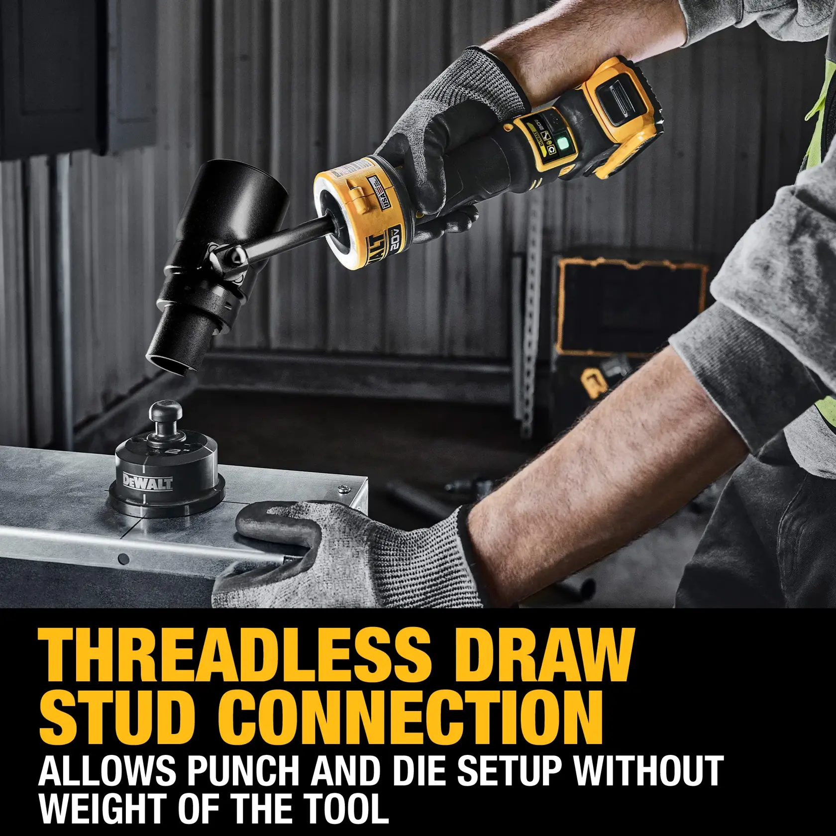 A person wearing gloves is using a DEWALT power tool with a threadless draw stud connection feature to set up a punch and die on a metal surface. The image highlights the ease of setup without needing to handle the weight of the tool.