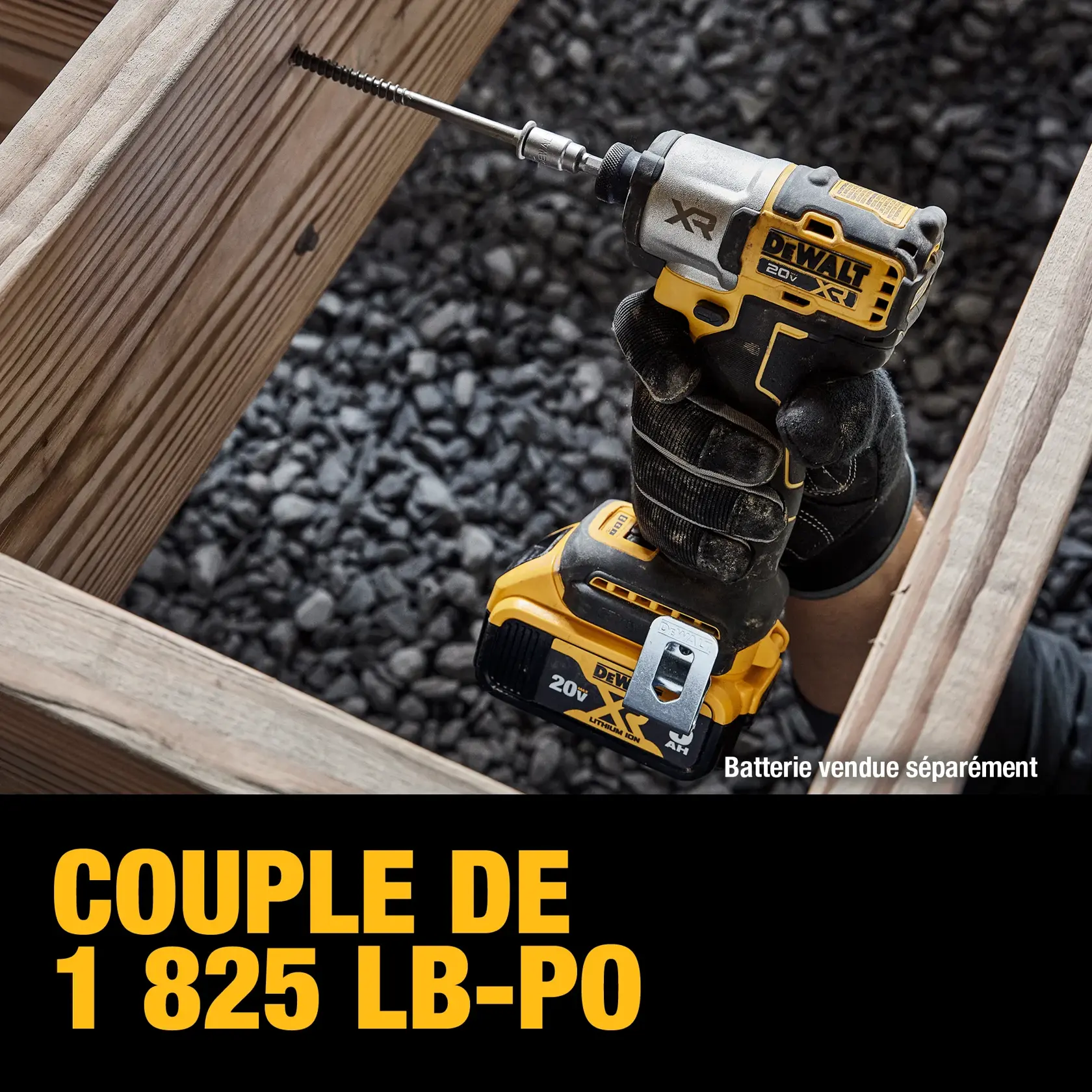 A person wearing work gloves holds a DEWALT 20V XR brushless impact driver with a drill bit attached, working between wooden beams over gravel. The image highlights the tool's 1,825 in-lbs. of torque. Text states that the battery is sold separately.