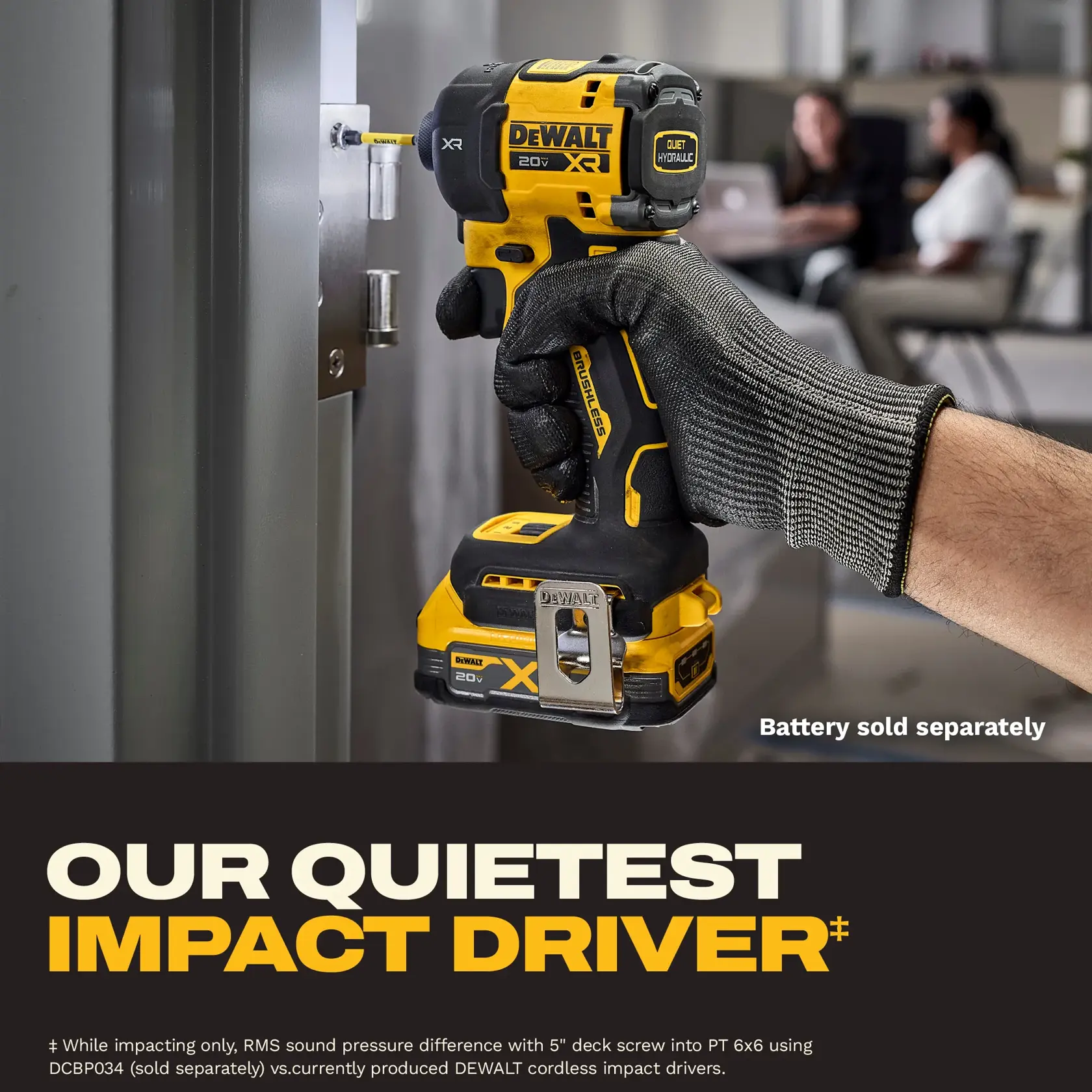 A close-up of a gloved hand using a DEWALT 20V XR cordless impact driver to screw into a metal surface. The tool is yellow and black, and text on the image indicates 'Battery sold separately' and 'Our quietest impact driver.' There are blurred office workers in the background.
