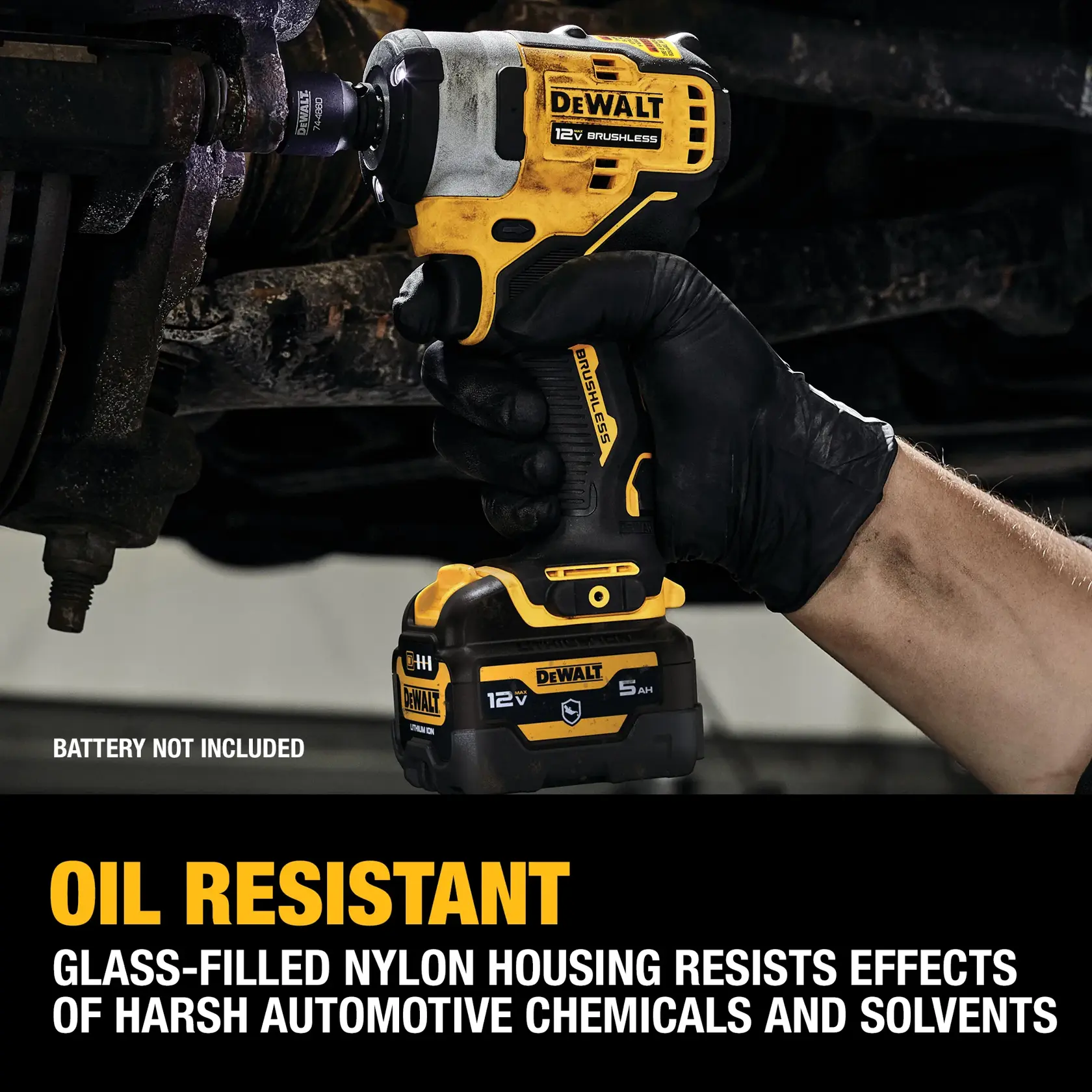 A DEWALT 12V brushless power tool is shown being used by a gloved hand to work on an automotive part. The tool features glass-filled nylon housing that resists the effects of harsh automotive chemicals and solvents. The image includes text stating 'Battery not included' and highlights the oil resistance of the tool.