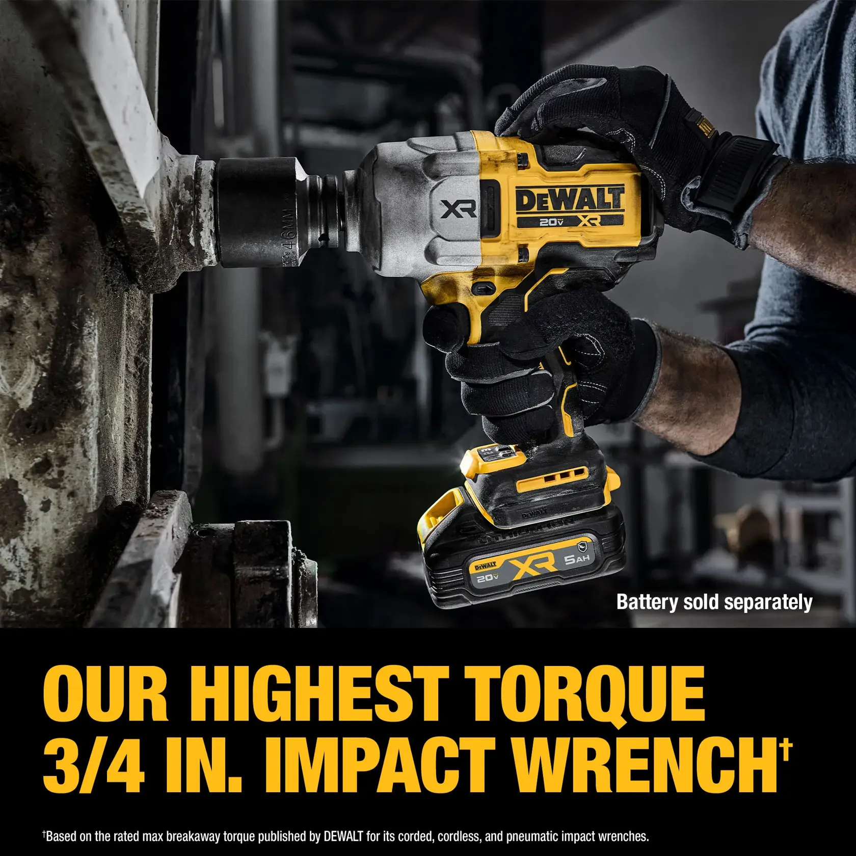 A person wearing gloves uses a DEWALT 20V XR cordless 3/4 inch impact wrench to tighten or loosen a large bolt on industrial equipment. The tool is shown in a close-up with the battery attached. Text on the image highlights its highest torque and notes that the battery is sold separately.