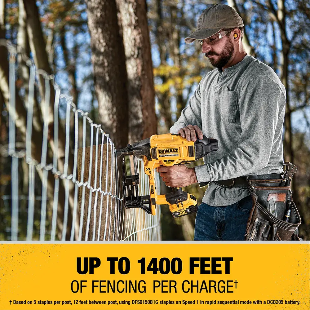 A person outdoors is using a DEWALT cordless fencing stapler tool to attach metal fencing to wooden posts. The tool is highlighted with a yellow banner below listing 'Up to 1400 feet of fencing per charge.' The surrounding environment includes trees and a tool belt worn by the person.