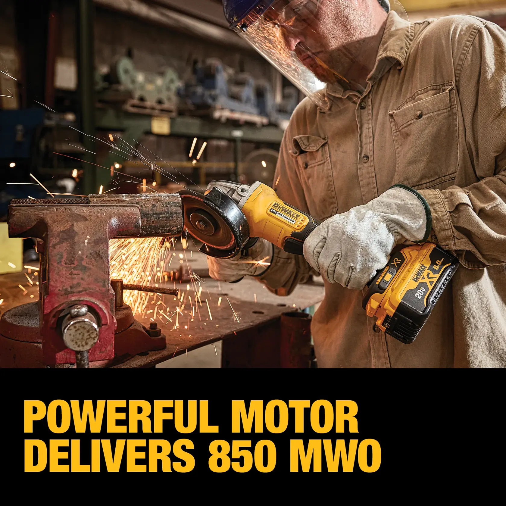 A person wearing protective gear uses a DEWALT DCG413R2 cordless angle grinder to cut a metal pipe held in a vise, with sparks flying. The text reads: 'Powerful motor delivers 850 MWO.'