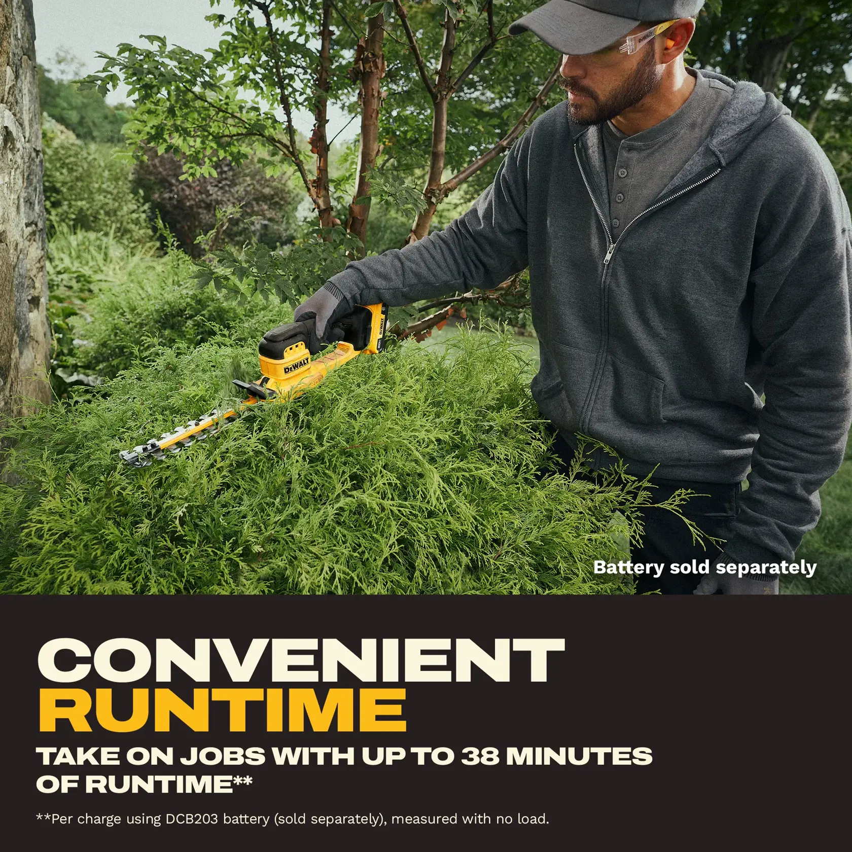 A person using a DEWALT cordless hedge trimmer to trim bushes outdoors. The trimmer is yellow and black, and the battery is sold separately. The image includes text highlighting convenient runtime of up to 38 minutes per charge and a note about using the DCB203 battery, measured with no load. The person's face is blurred.