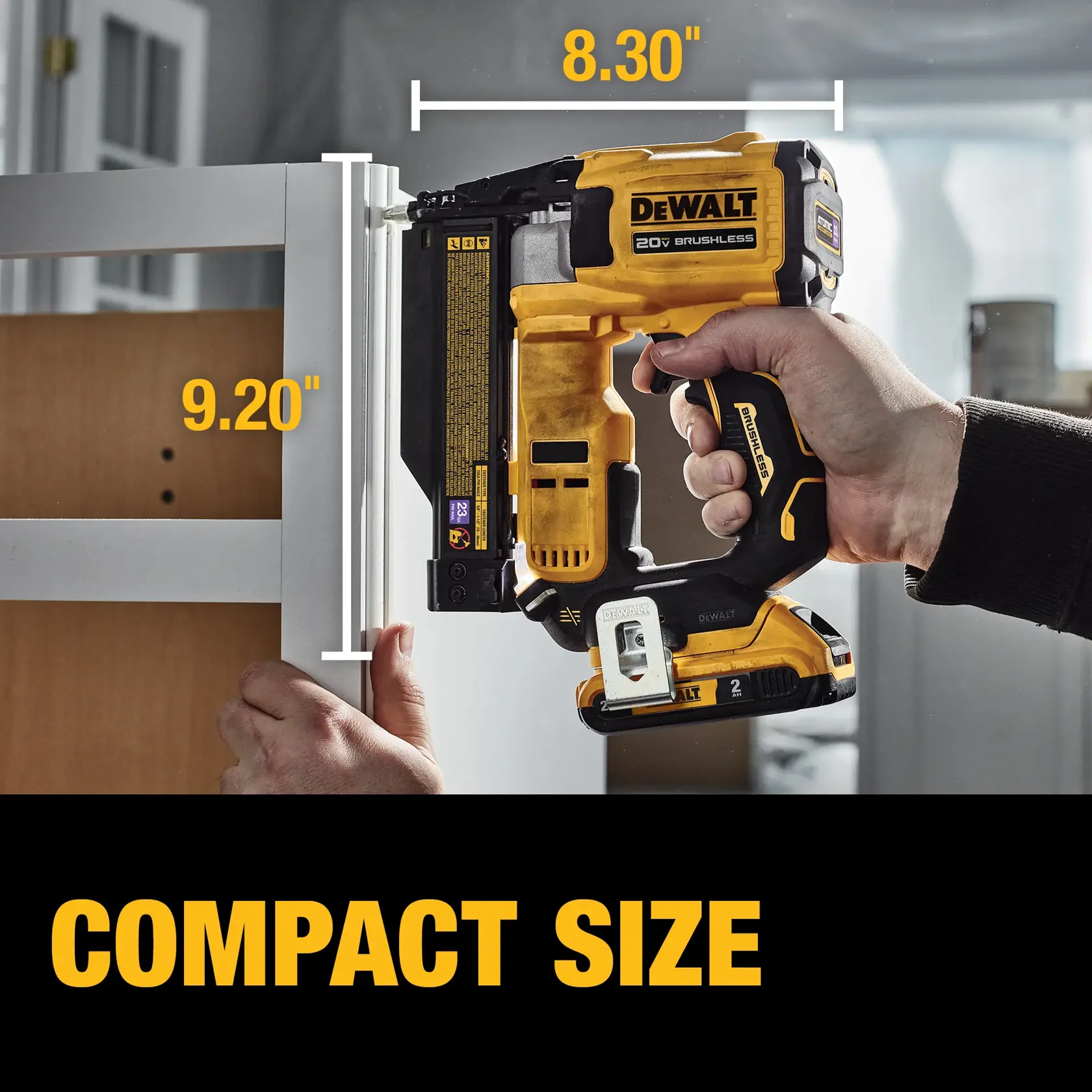 A person uses a DEWALT 20V brushless cordless tool, model DCN623D1, to nail trim onto a cabinet. Text on the image highlights the compact size of the tool with measurements of 8.30 inches wide and 9.20 inches tall.