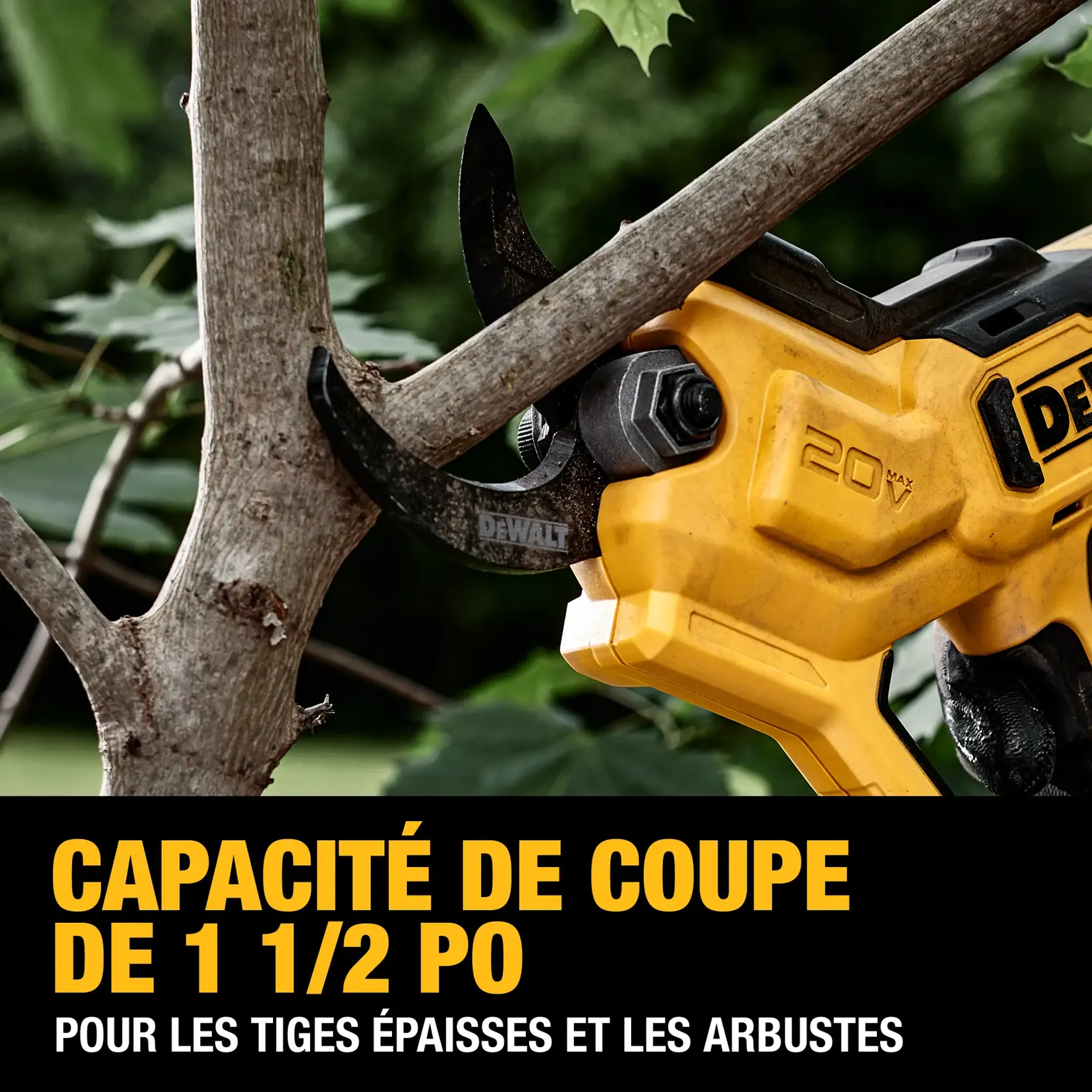 A close-up of a DEWALT 20V power tool cutting a thick tree branch. The tool highlights a 1-1/2 inch cut capacity for thick stems and shrubs, with bold yellow and black branding on the device.