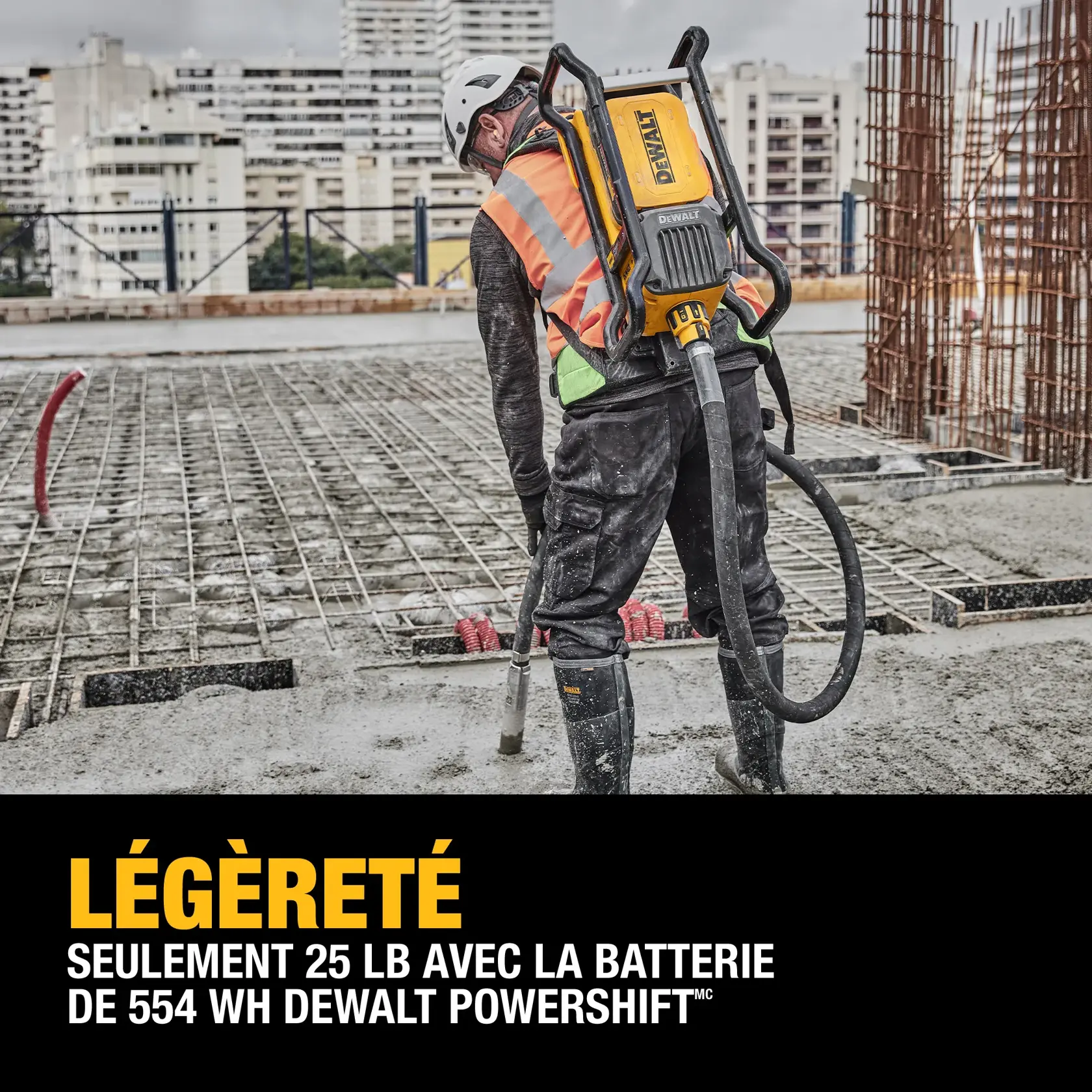 A construction worker using a DEWALT Powershift tool with a 554Wh battery on a reinforced concrete slab, wearing safety gear including a helmet and vest. The text highlights the lightweight 25 lbs. design of the equipment.