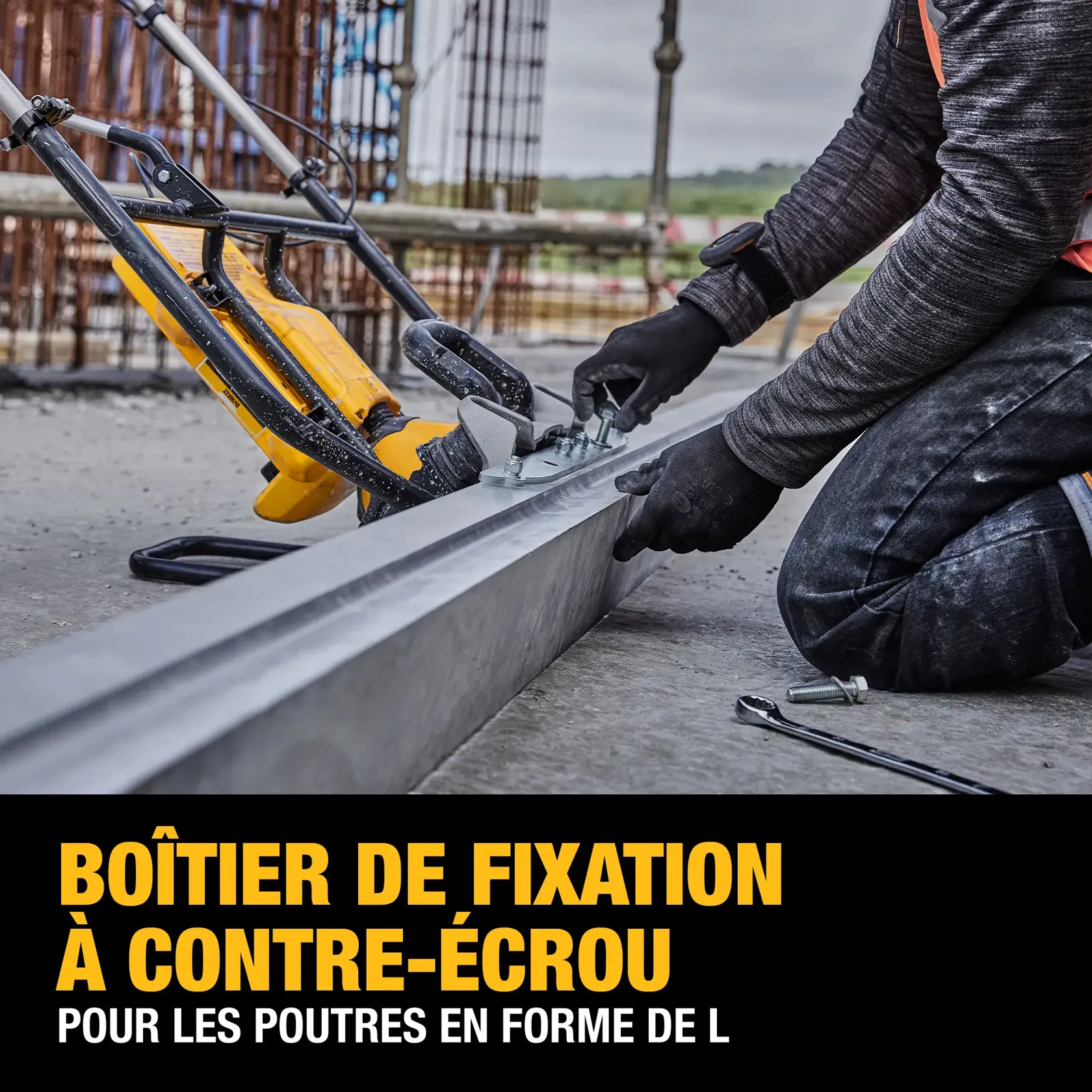 Workers wearing safety vests and helmets are leveling concrete at a construction site using a DEWALT power tool. The area is structured with steel beams, and the ground appears freshly poured and smoothed.