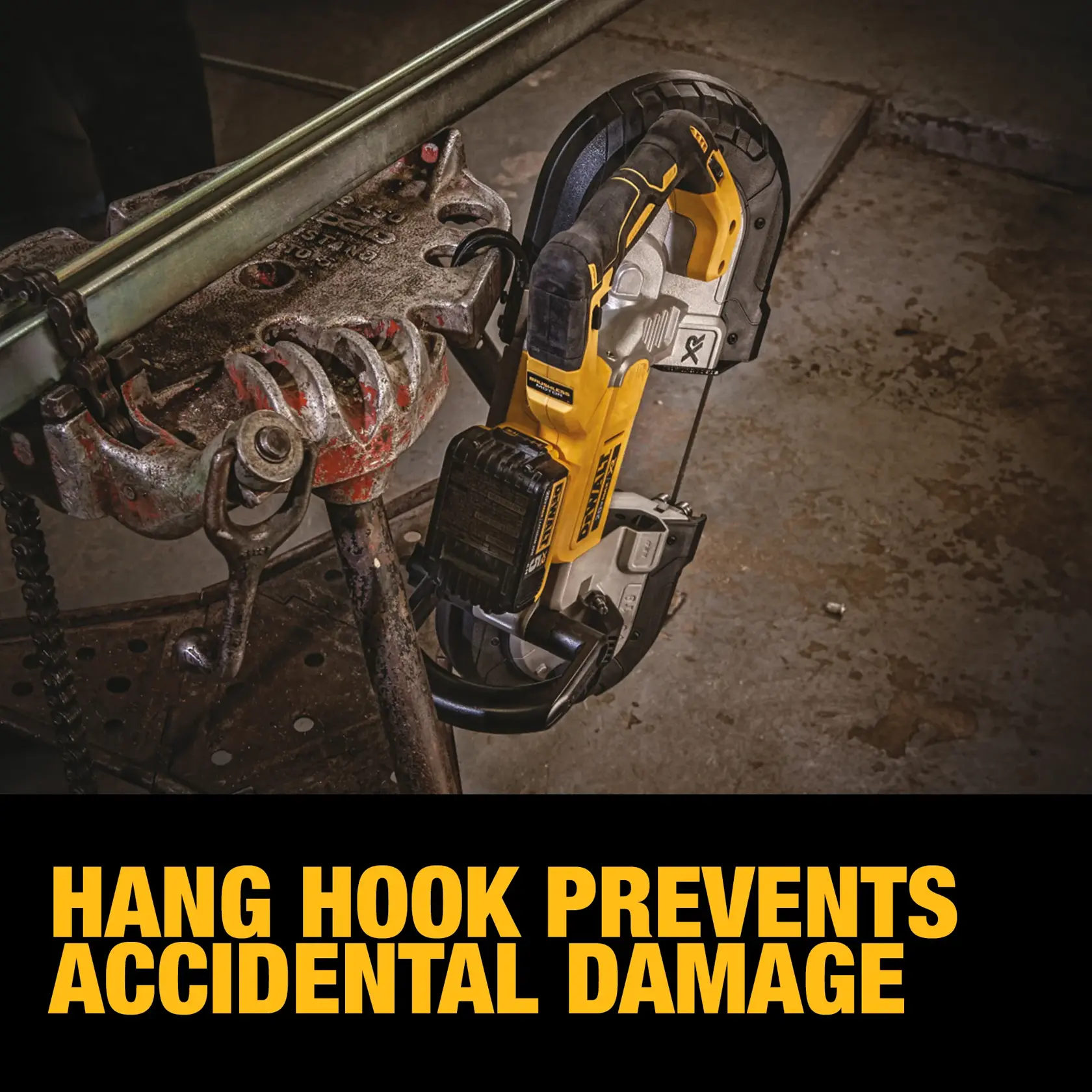 A DEWALT cordless portable band saw is hanging by its hook from a metal pipe stand in a workshop environment. Text on the image states, 'Hang hook prevents accidental damage.'