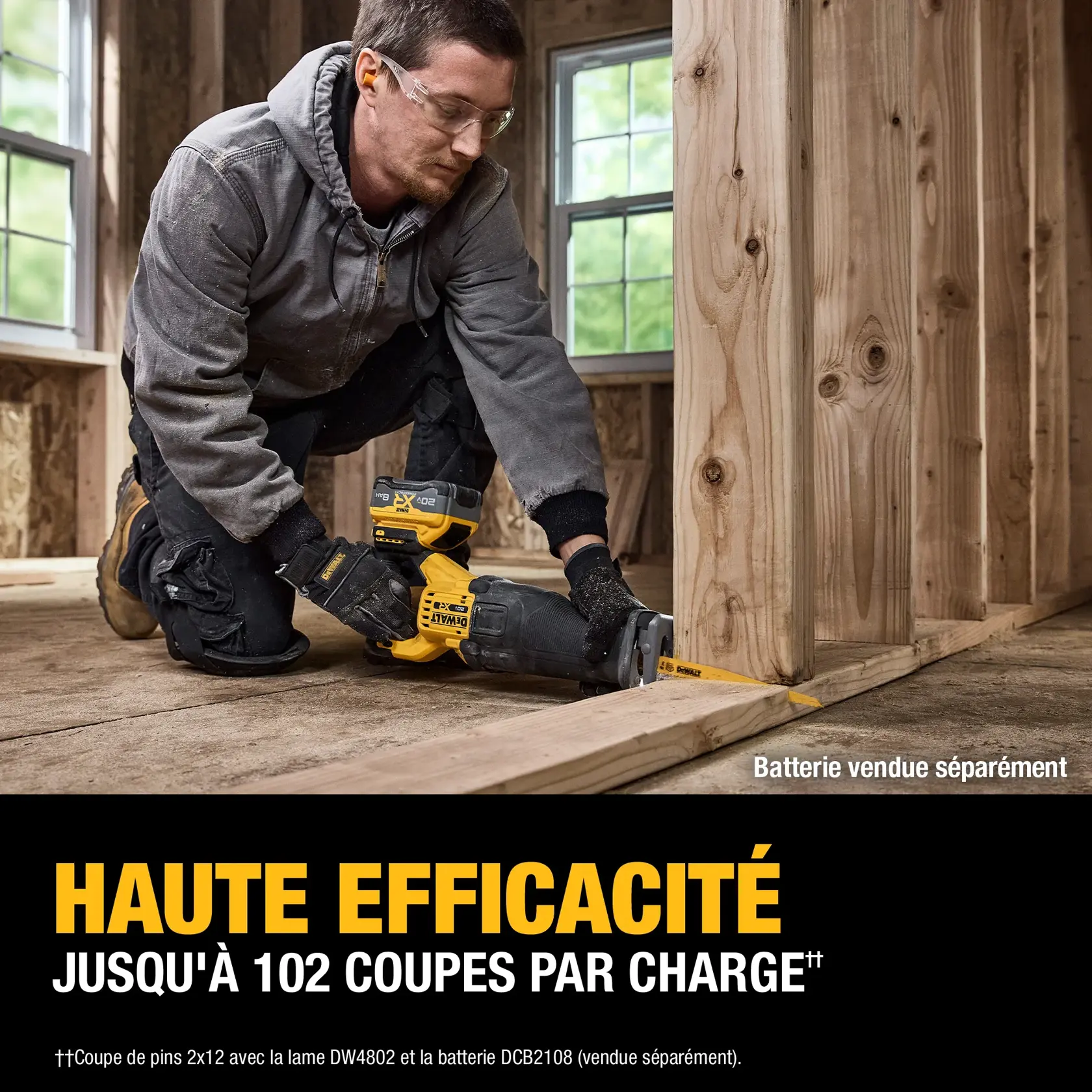 A person kneeling on a wooden floor is using a DEWALT cordless reciprocating saw (model DCS384B) to cut a wooden board inside a partially finished room. The saw is promoted as having high efficiency, capable of up to 102 cuts per charge. Battery is sold separately, as noted in the image.