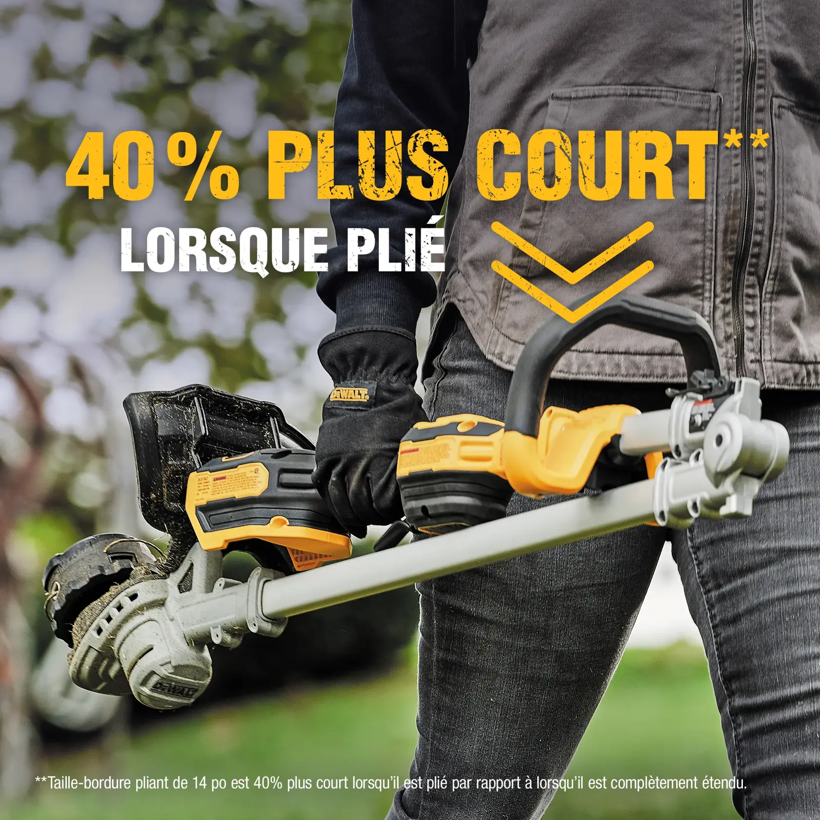 Person using a DEWALT string trimmer to trim grass around a tree in a residential yard, with a white house and greenery in the background.