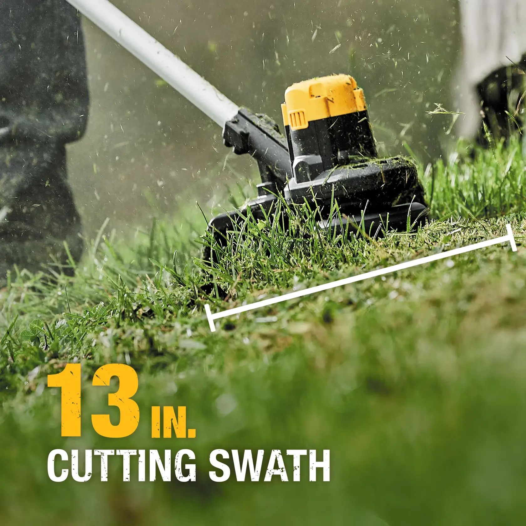 Close-up of a DEWALT trimmer in use cutting grass, showing a 13-inch cutting swath on the lawn.