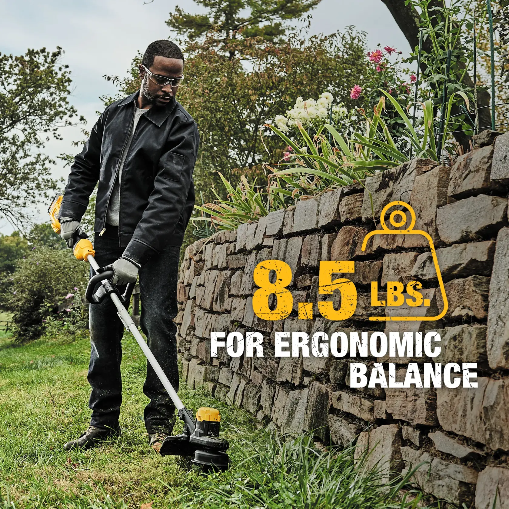 Person using DEWALT string trimmer near stone wall. Text: 8.5 lbs for ergonomic balance.