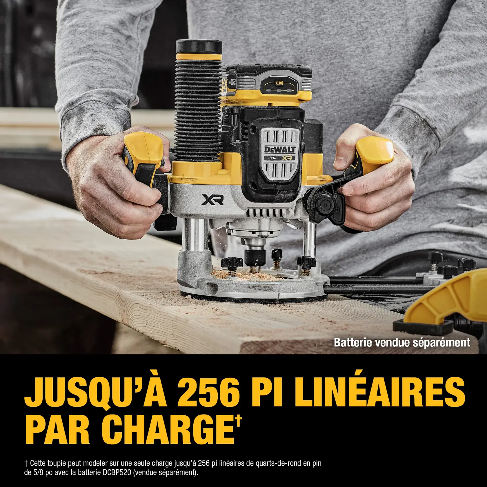 A person uses a DEWALT XR cordless router (model DCW620B) on a wooden plank. The text highlights that the router can complete up to 256 linear feet of runtime per charge. The battery is sold separately.