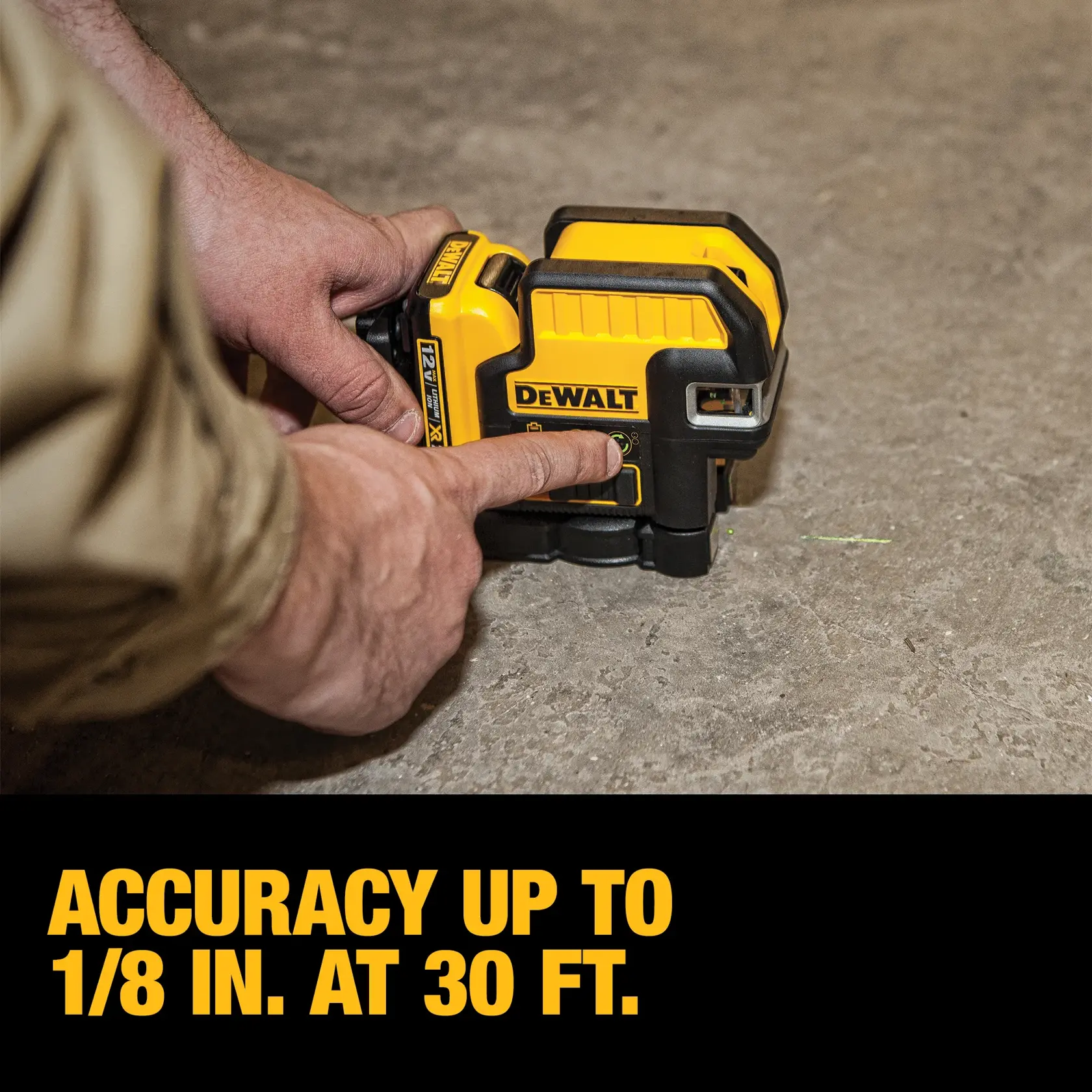 A person operating a DEWALT yellow and black laser level tool placed on the floor, with text overlay stating 'Accuracy up to 1/8 in. at 30 ft.'.