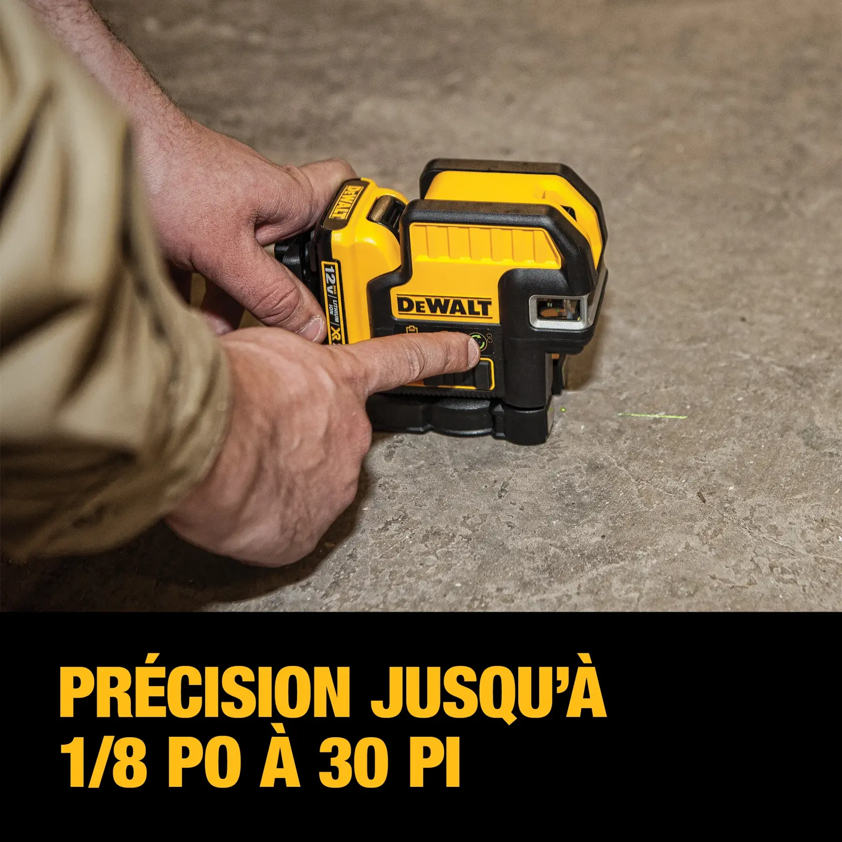 A person operating a DEWALT yellow and black laser level tool placed on the floor, with text overlay stating 'Accuracy up to 1/8 in. at 30 ft.'.