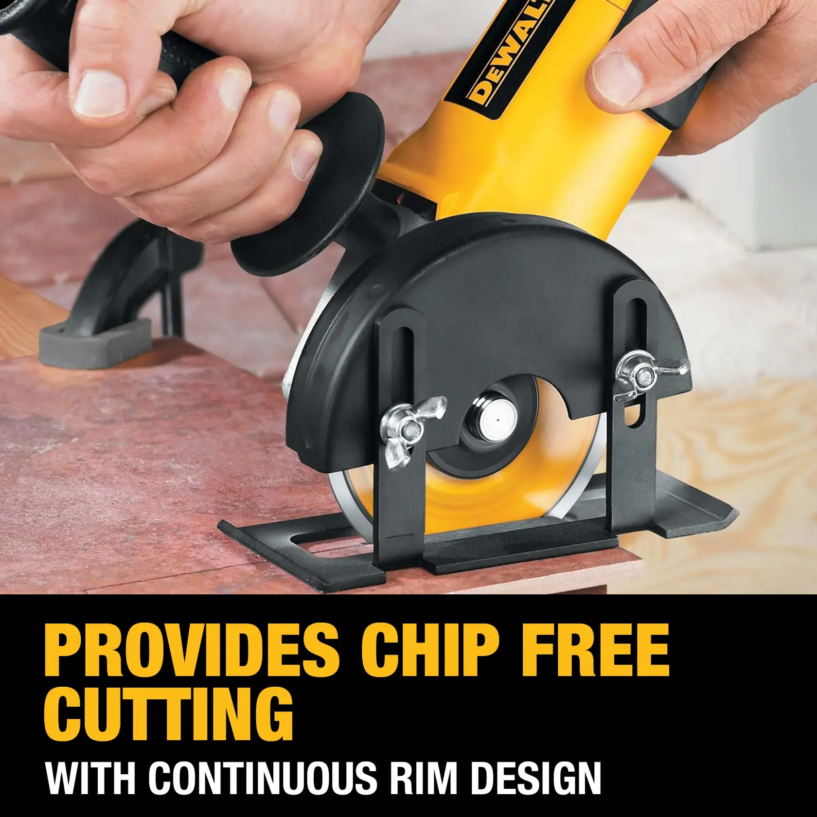 A close-up of a DEWALT power tool being used to cut a tile, highlighting its continuous rim design for chip-free cutting. The tool is yellow and black, and hands are guiding it over the material, with a clamp securing the tile.