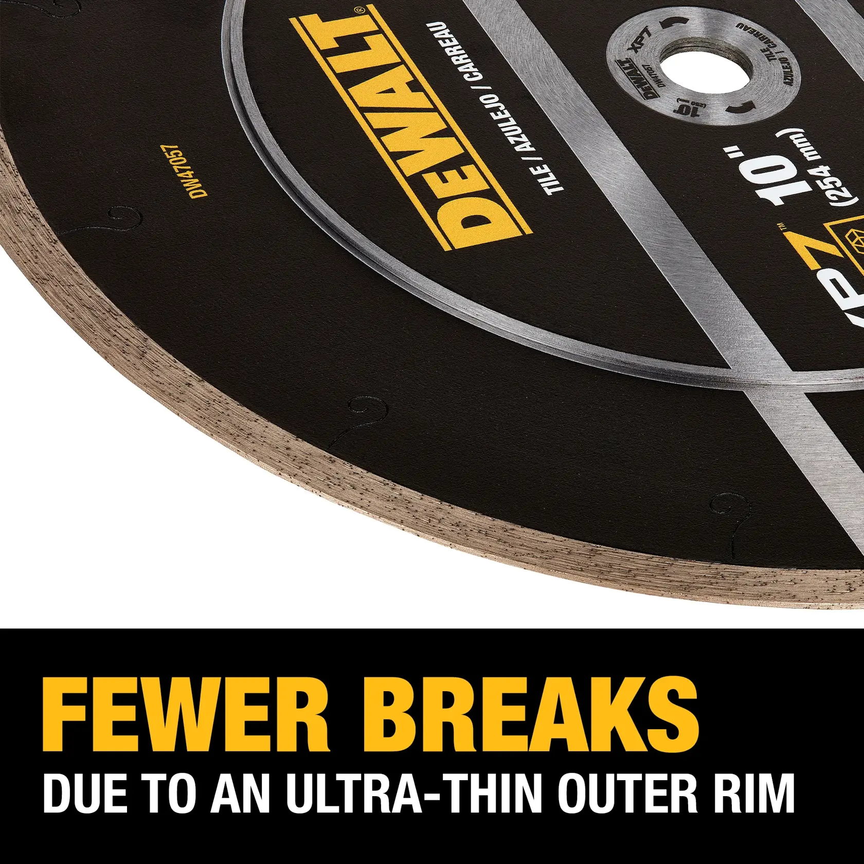 Close-up of a DEWALT 10-inch tile saw blade showing the ultra-thin outer rim. Text on image highlights 'Fewer Breaks due to an Ultra-Thin Outer Rim.'