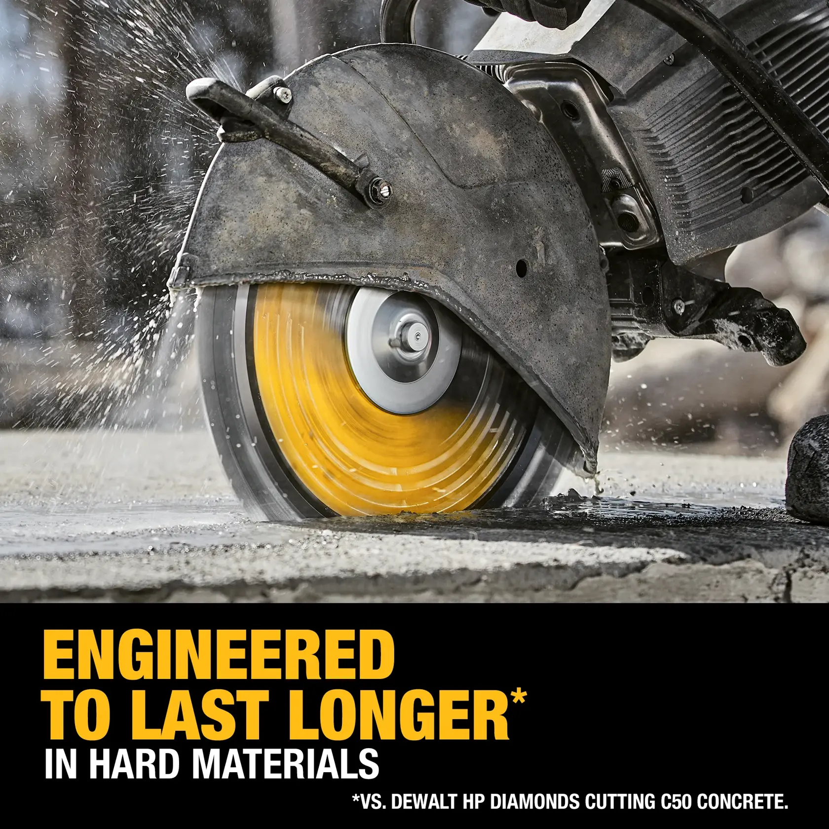 Close-up of a DEWALT circular saw with a yellow blade cutting through concrete, with water spraying and text saying 'Engineered to Last Longer in Hard Materials.'