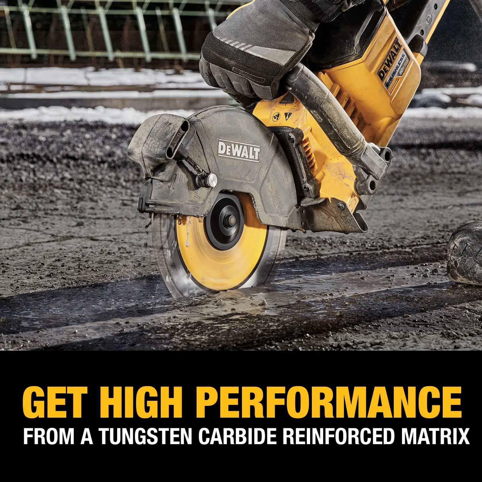 Close-up of a DEWALT power saw being used to cut through a rough surface, highlighting its tungsten carbide reinforced matrix and high performance capabilities.