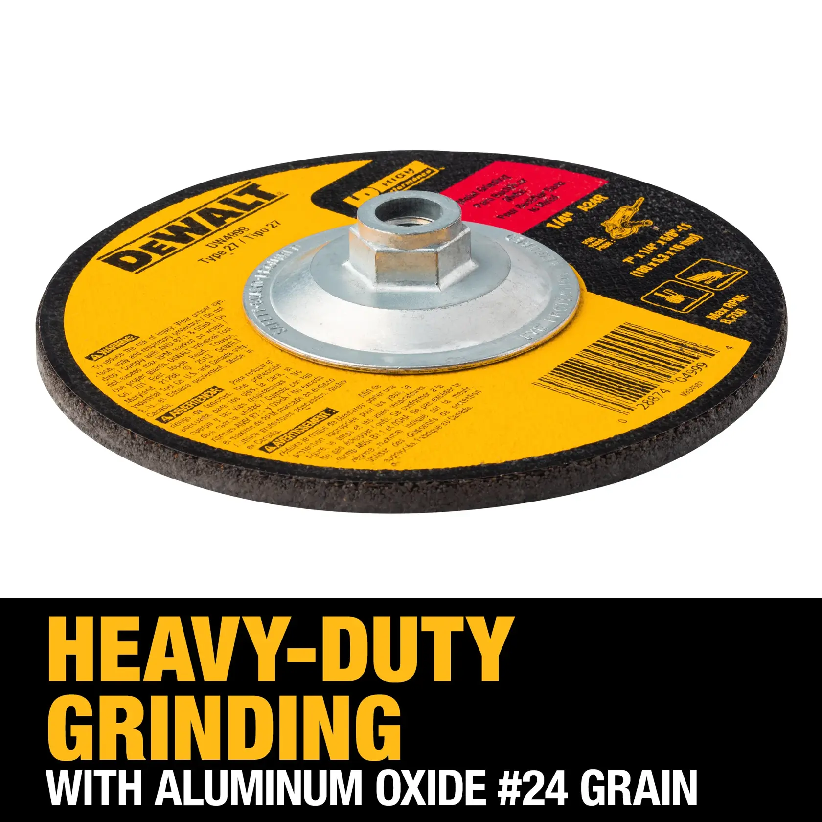 A DEWALT heavy-duty grinding wheel with aluminum oxide #24 grain, featuring a yellow and black label and metal mounting hub, placed on a white background. Bold text underneath reads: 'HEAVY-DUTY GRINDING WITH ALUMINUM OXIDE #24 GRAIN.'