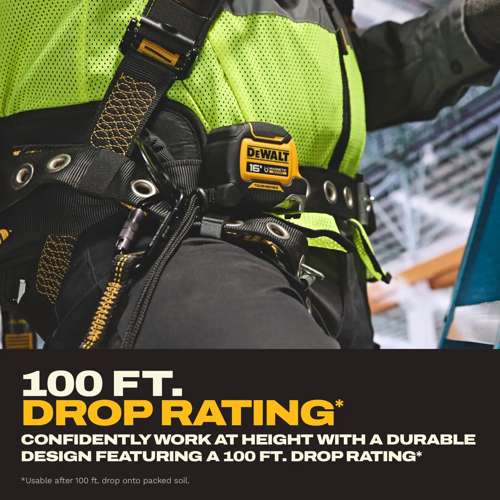 Close-up of a DEWALT 16 ft magnetic tape measure attached to a worker's safety harness. The worker is wearing high-visibility clothing and appears to be on a jobsite. Text in the image highlights the product's 100 ft drop rating and its durable design for working at heights.