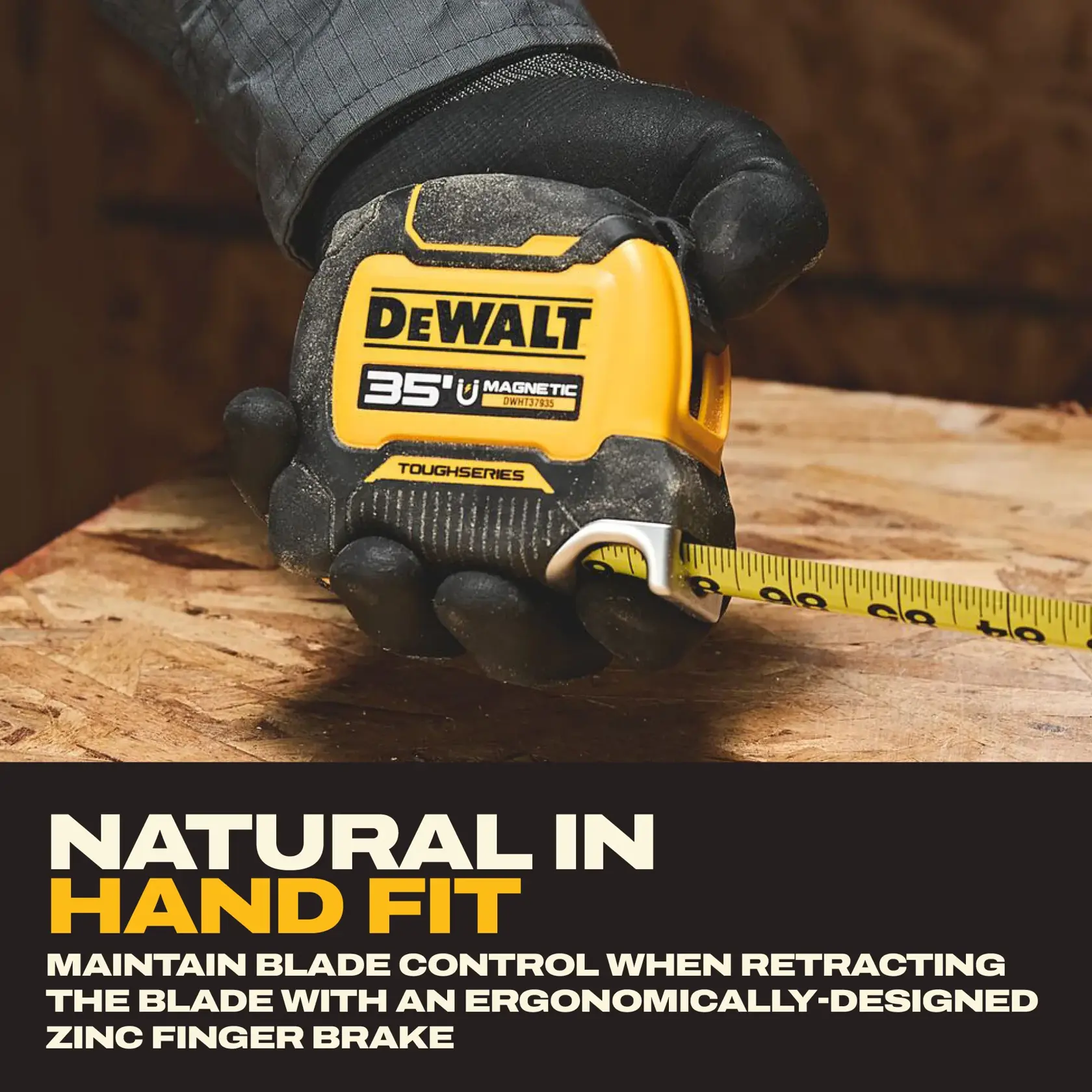 A close-up of a gloved hand holding a DEWALT ToughSeries 35-foot magnetic tape measure (SKU: DWHT37935S) on a wooden surface, with the tape extended. Text describes the product as having a natural hand fit and features an ergonomically-designed zinc finger brake for blade control.