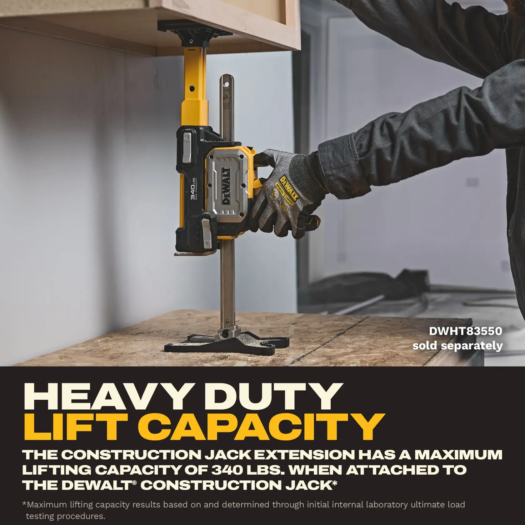 DEWALT construction jack is used to lift a cabinet. Gloved hand adjusts heavy duty tool for precise positioning.