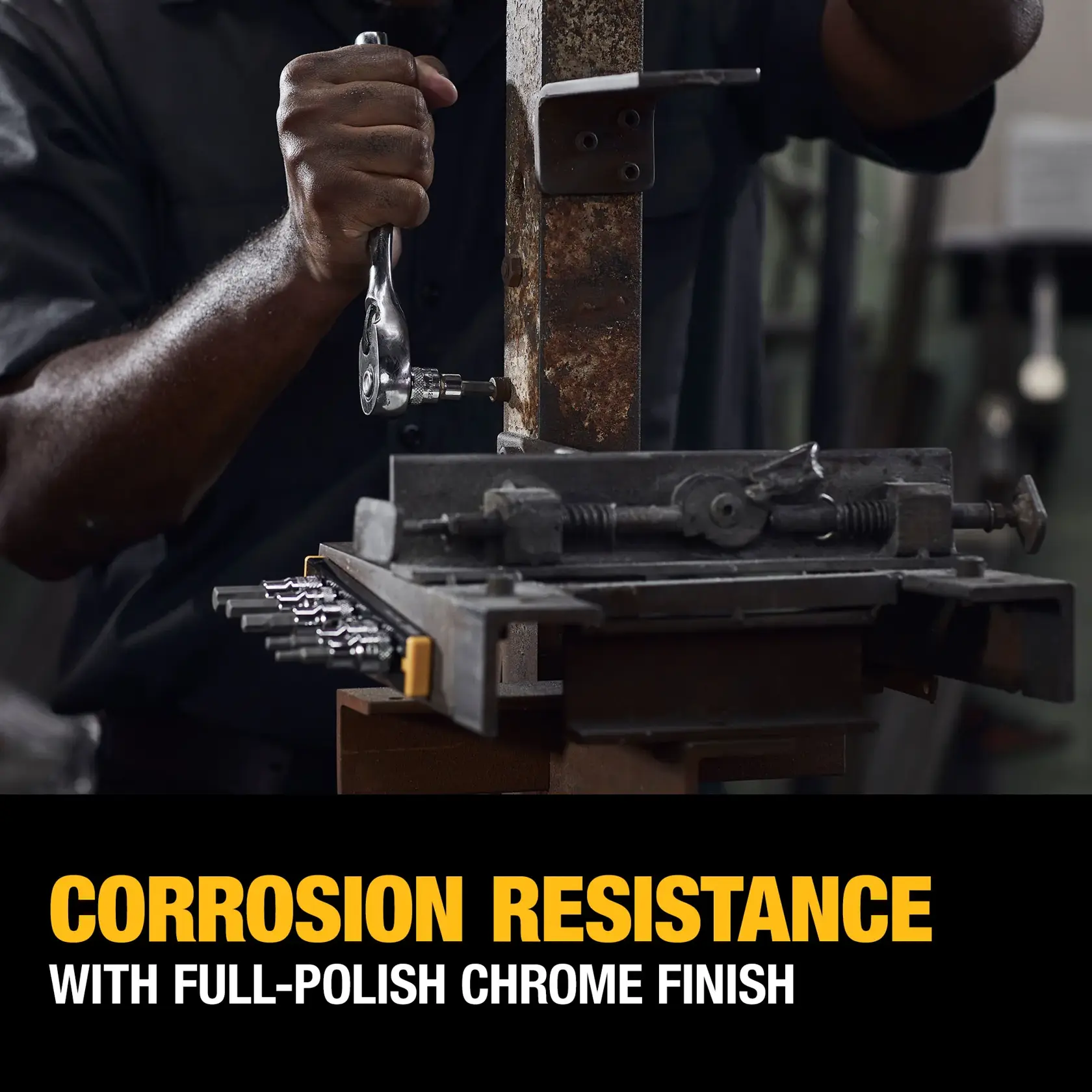 A person using a DEWALT ratchet wrench on a rusty metal surface with other wrenches nearby. Text reads: 'Corrosion resistance with full-polish chrome finish.'
