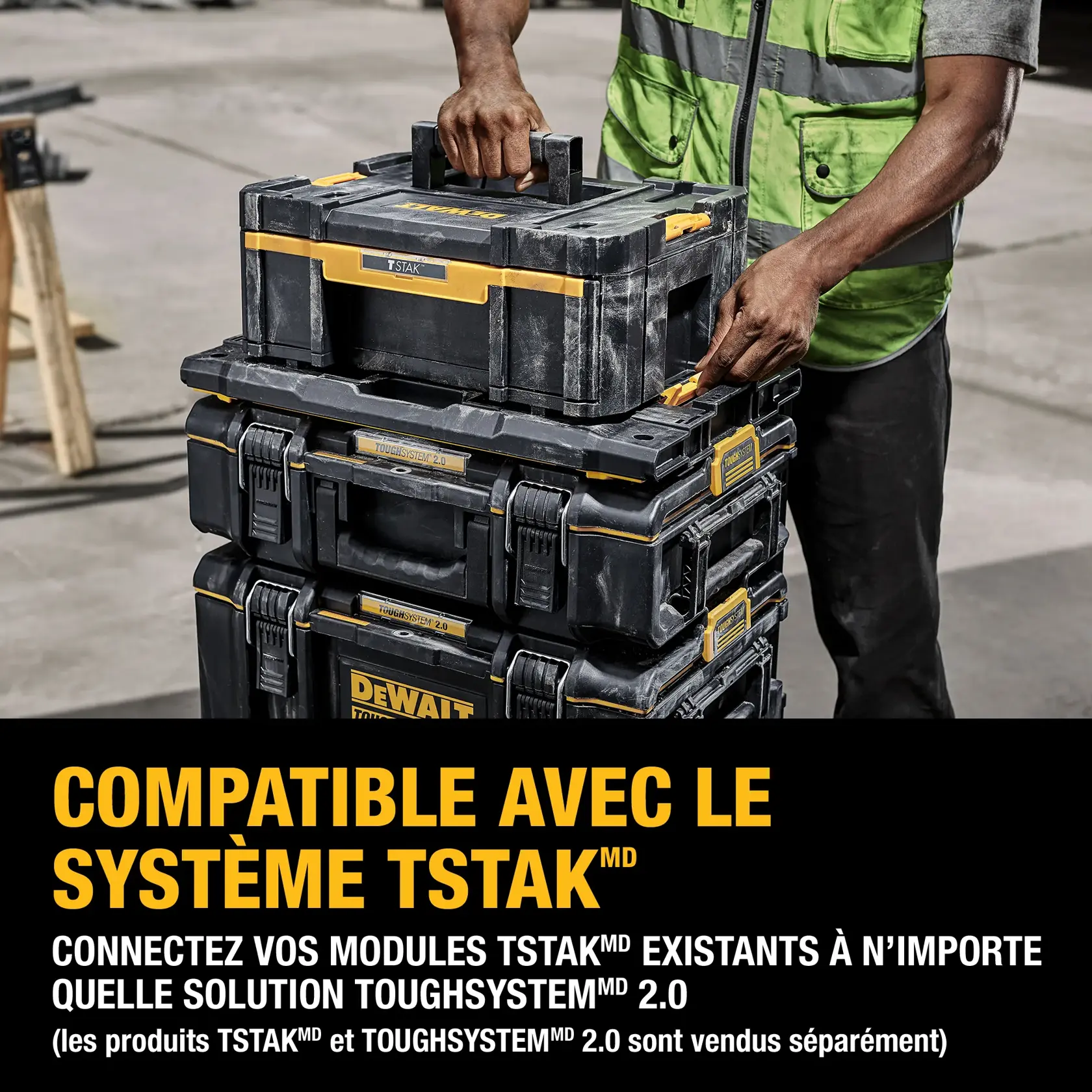 A person in a safety vest is stacking DEWALT ToughSystem 2.0 toolboxes and placing ToughCase+ sets on top. The text on the image states that these toolboxes are compatible with ToughCase+ sets and encourages adding them to the ToughSystem 2.0 storage solution.