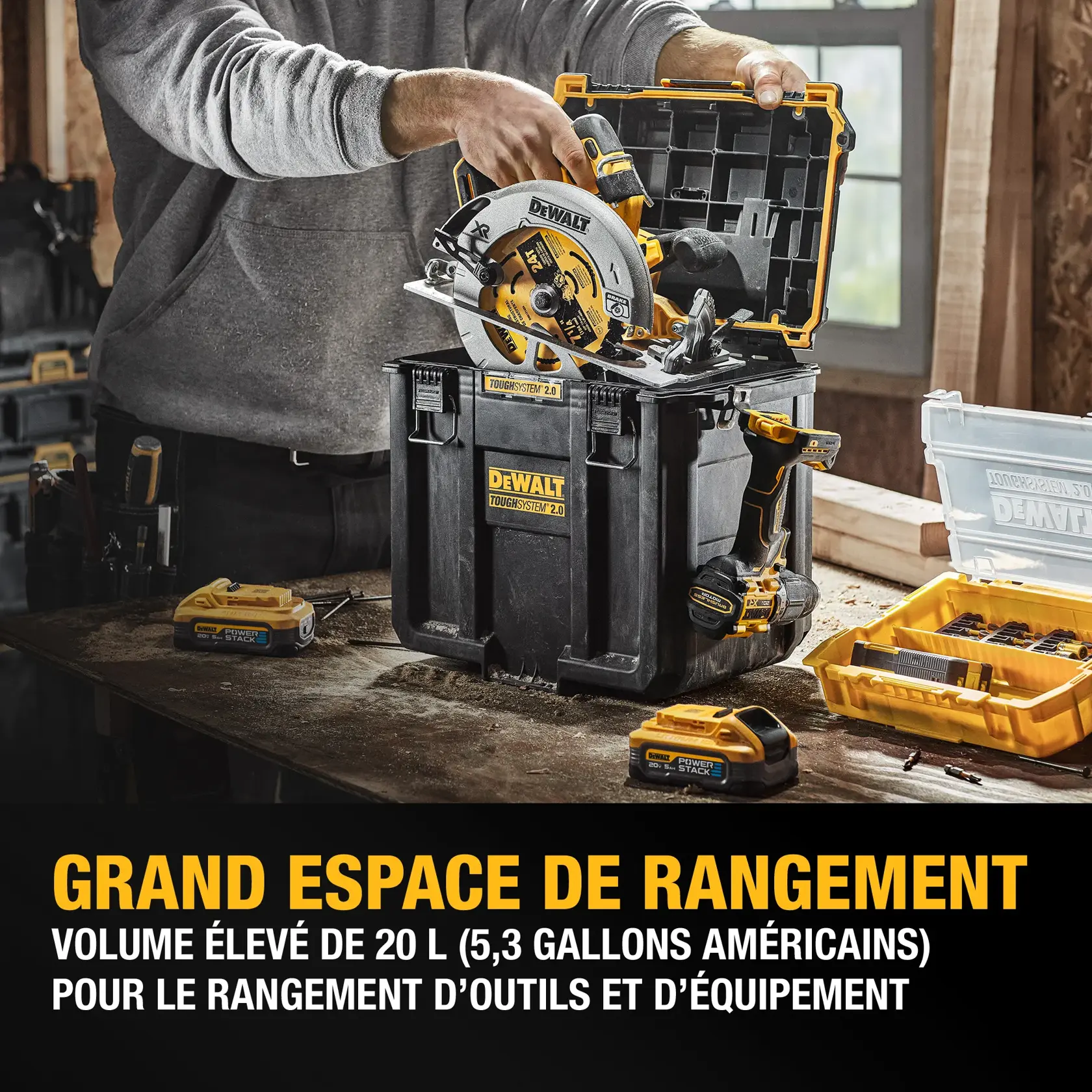 Open DEWALT ToughSystem tool organizer box with internal compartments and removable dividers. Several callouts highlight features: optimized organization with four removable dividers, IP65-rated dust and water seal for maximum durability, customizable attachment for other TOUGHSYSTEM toolboxes, reinforced metal wire latches, customizable labeling plate, and additional storage capacity with side handles for hanging tools and accessories.
