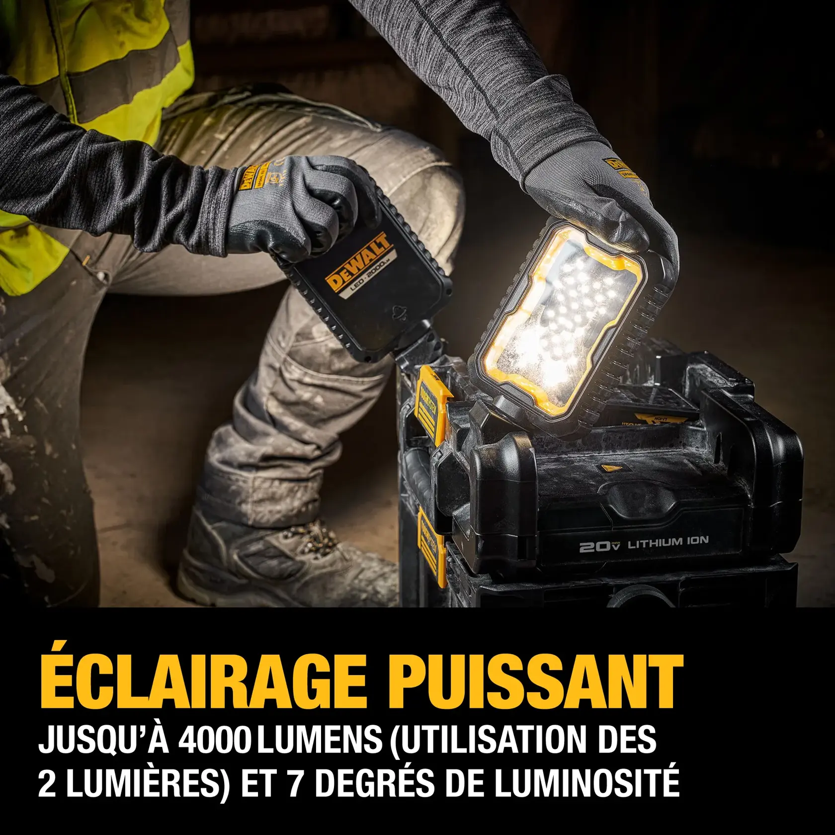 DEWALT TOUGHSYSTEM 2.0 portable work light with two adjustable LED panels mounted on a durable black and yellow case, designed for use with 20V lithium ion batteries.