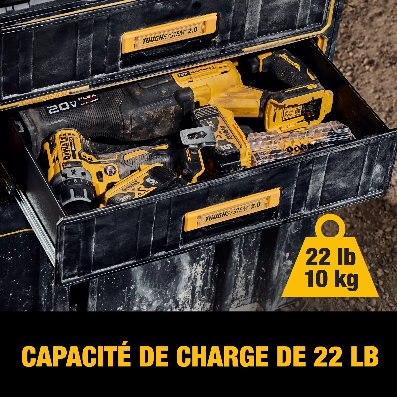Two construction workers wearing safety helmets and vests are using a DWST08550 DEWALT rolling tool storage cart in a building under construction. The cart has multiple drawers and compartments open, showing various DEWALT tools placed on top and inside. The cart is positioned on wheels for mobility.