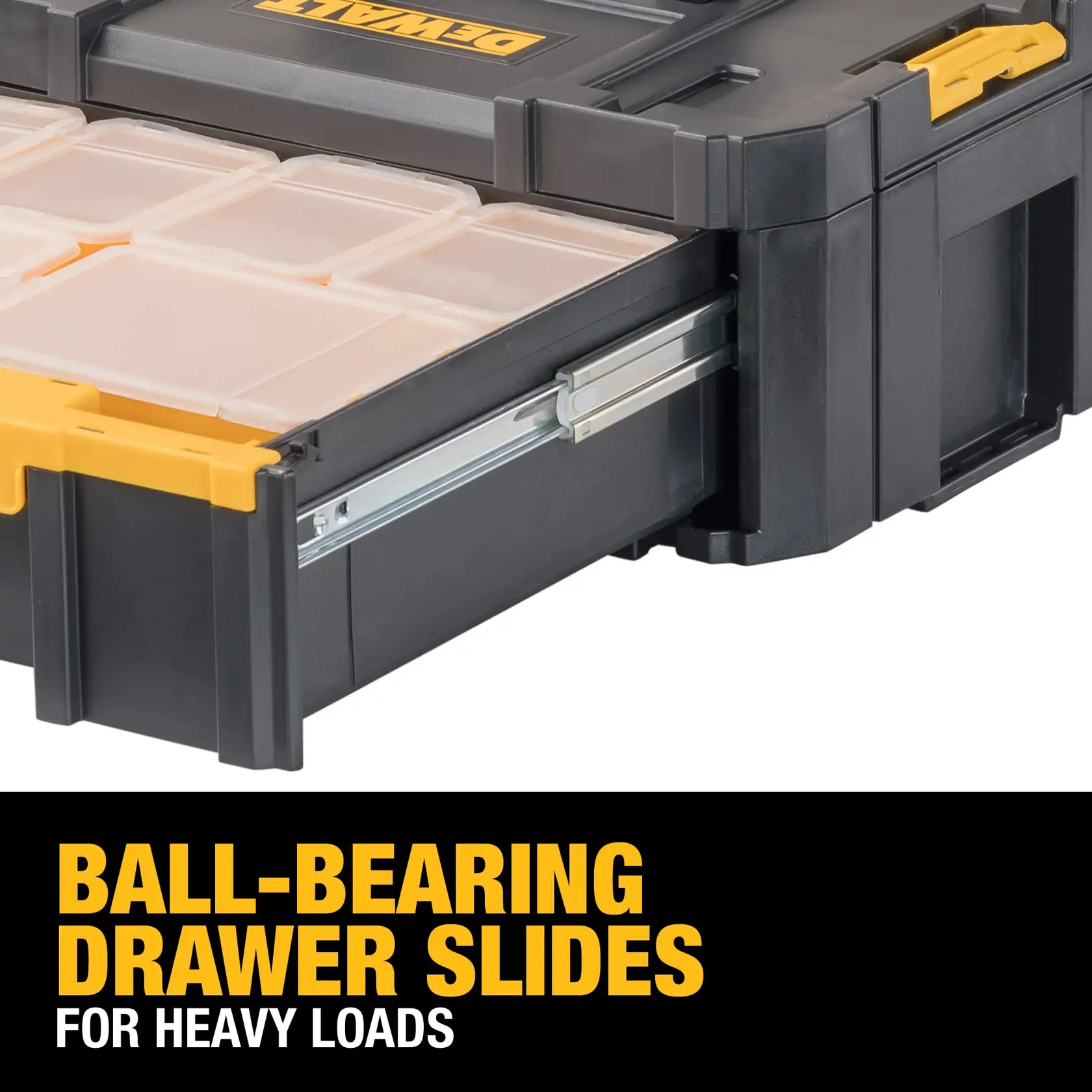 Close-up of a DEWALT black and yellow tool storage box (SKU: DWST17803) with transparent organizer containers inside an open sliding drawer. The drawer features metal ball-bearing slides designed for heavy loads. Text on the image highlights the ball-bearing drawer slides for heavy loads.
